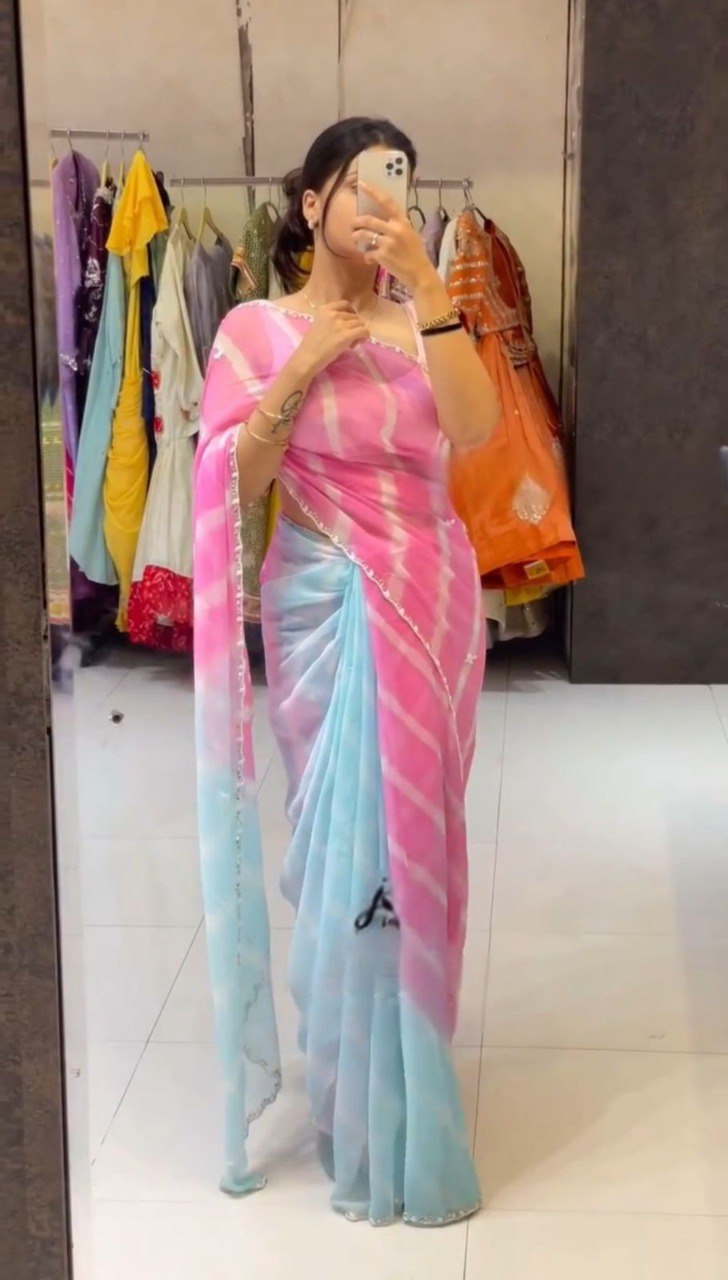 Model showcasing a beautiful pink and blue Lehriya Tebi silk saree with handwork border, full view.