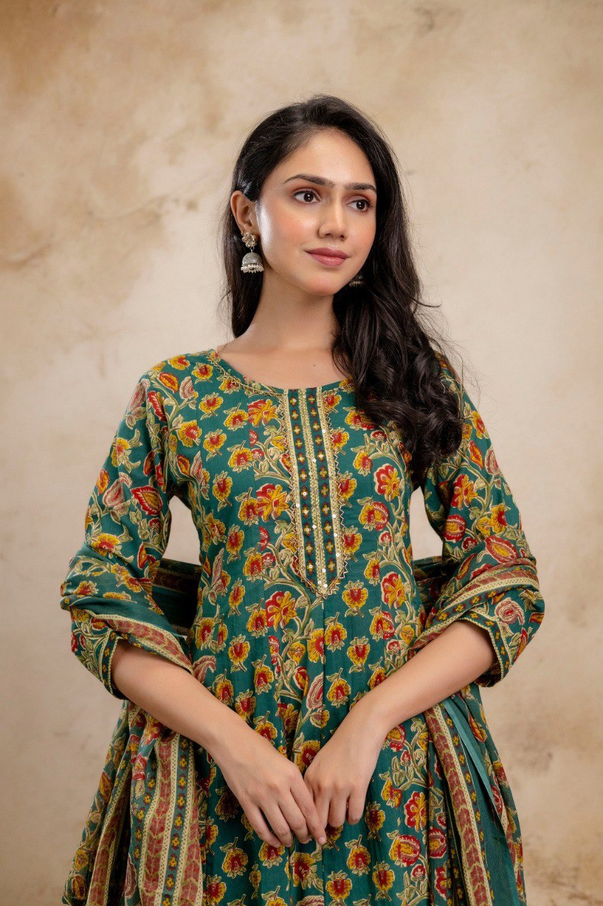 Close-up of model wearing an Emerald Green floral A-line kurti with intricate handwork on the neckline from TRENDBUY.