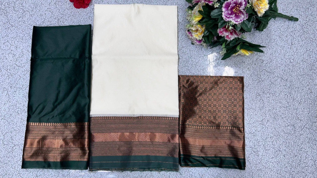Flat lay of TRENDBUY Kanjiveram Silk half saree lehenga fabric set in green: cream lehenga, green blouse piece, and banarasi voni.