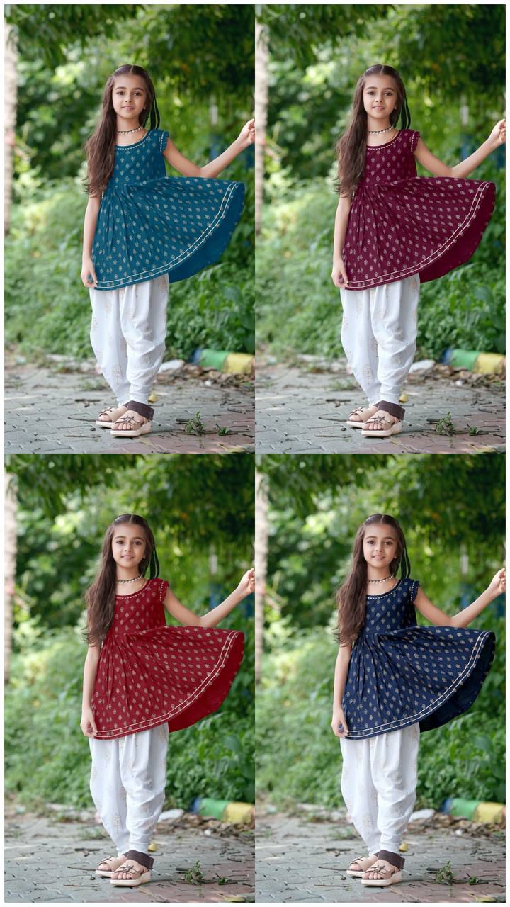 Collage showing the kids dhoti set in all 4 colors: navy, teal, maroon, and wine