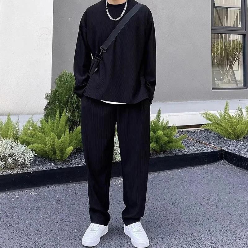 Man in solid color men's round neck co-ord set, perfect for casual style and comfort.