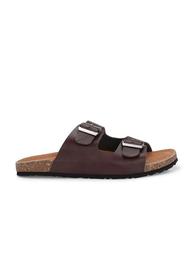 Brown sandal with cork sole on a white background