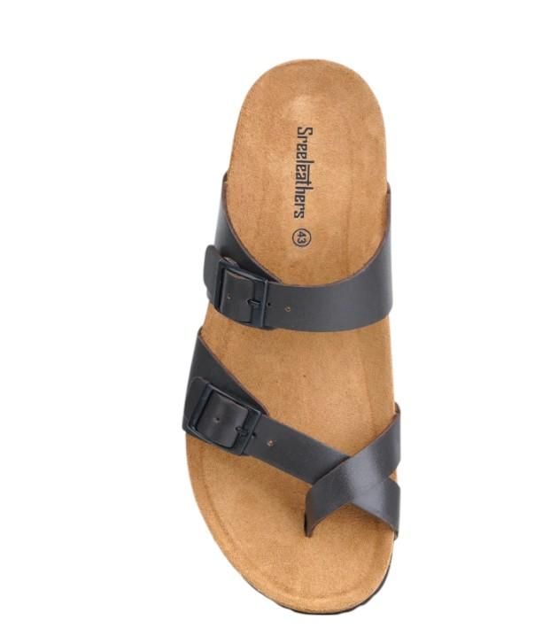Birkenstock sandal with black straps on a white background