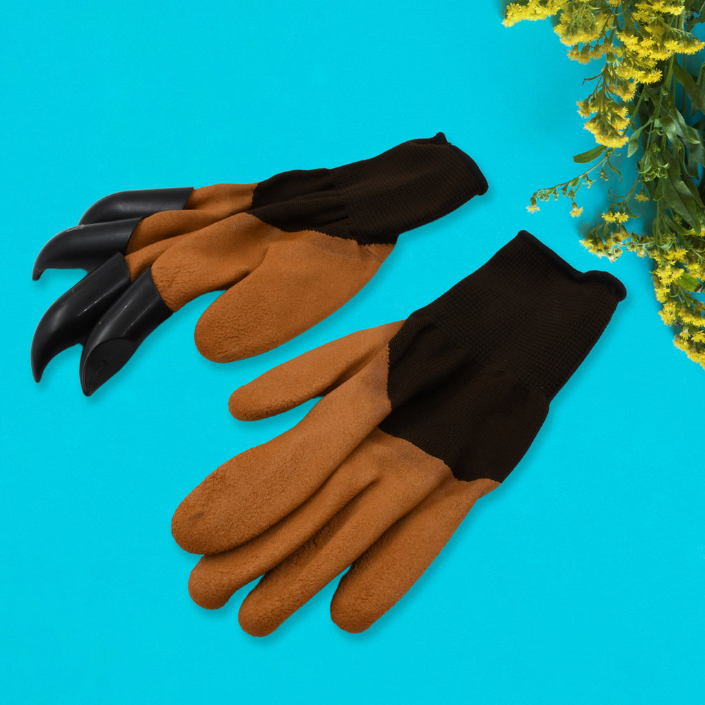 Close-up of the four sharp black ABS plastic claws attached to the right-hand fingertips