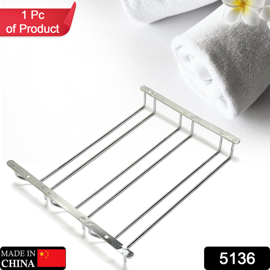 Stainless steel upside-down wine glass holder rack mounted under a bar, multi-use design.