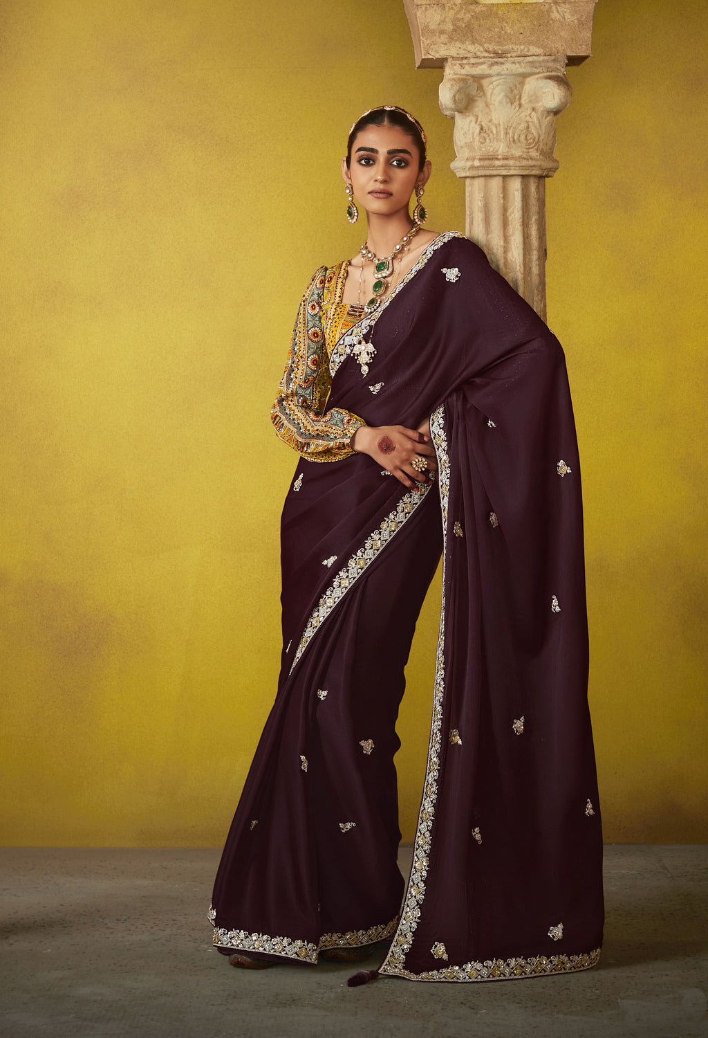 Beautiful brown saree with a stunning digital print blouse.