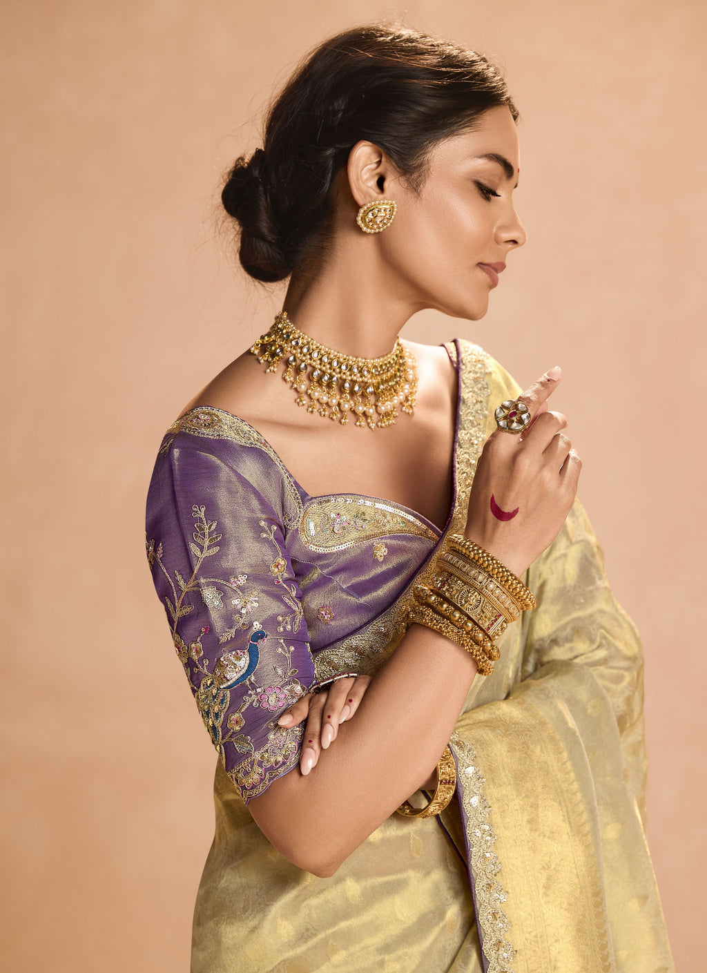 Close-up of intricate heavy embroidery lace work on the saree border