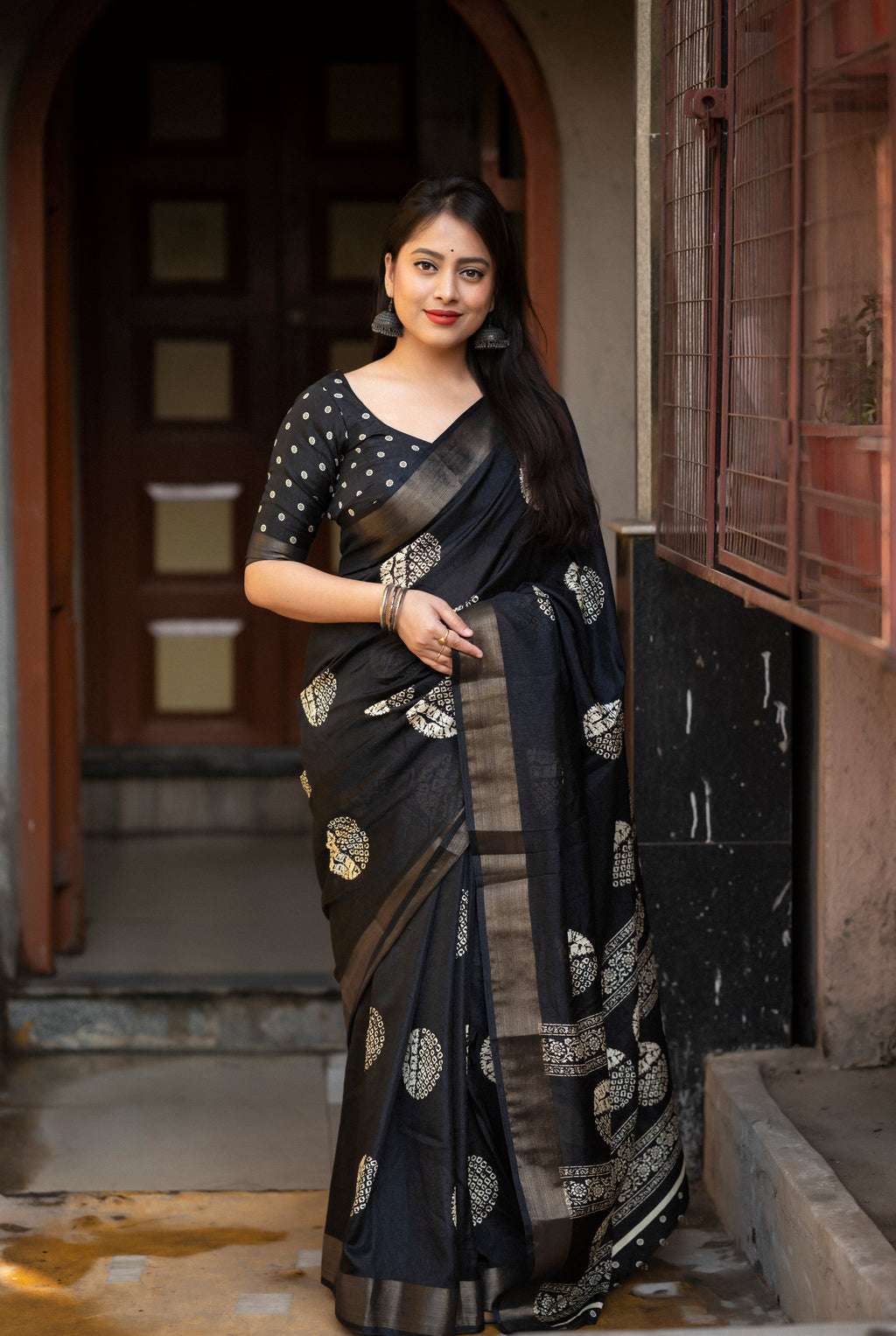 Black cotton sari featuring a unique batik print