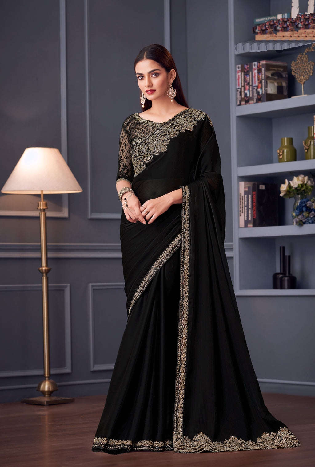 Black Party Wear Sartin Chiffon Saree modeled by a woman