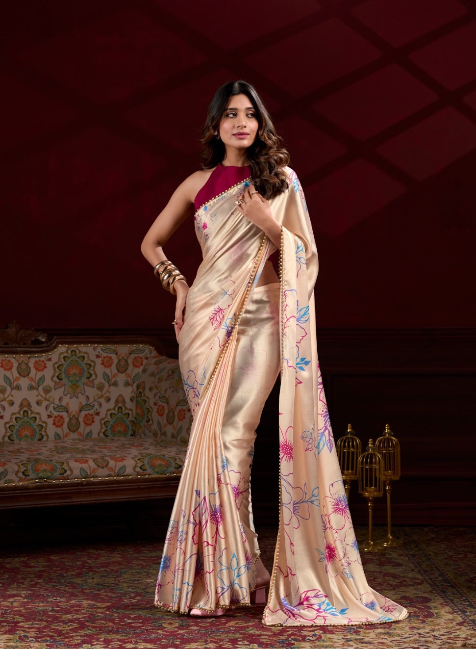 Cream Japan satin silk saree with digital floral print and pearl lace border.