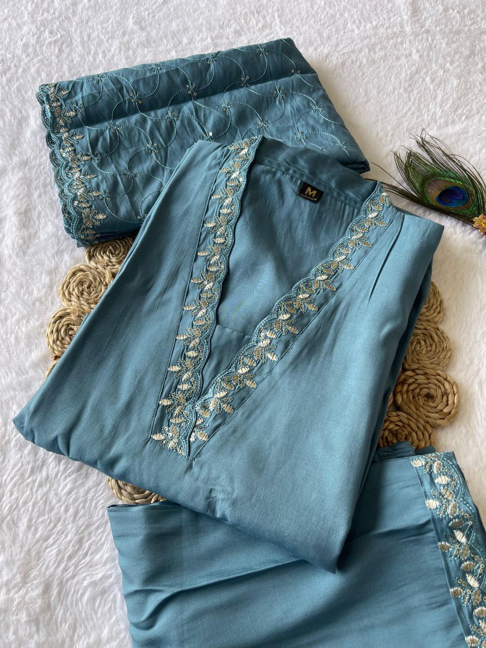 Model wearing the Candy Floss Embroidered Work Kurta Pant Dupatta set, highlighting the intricate detail.