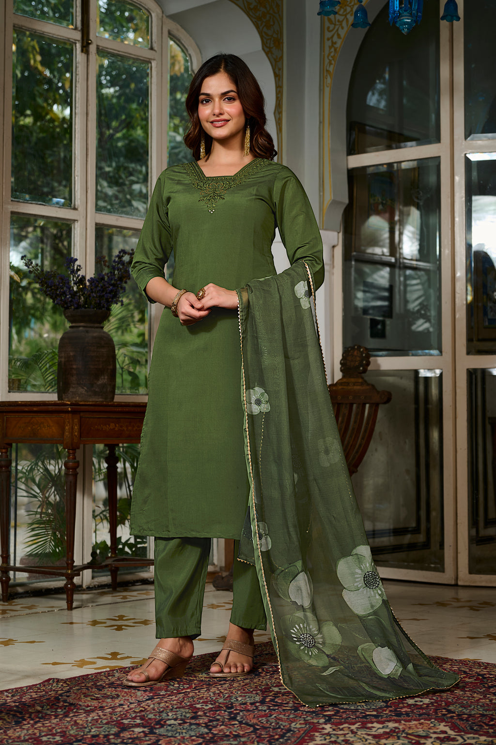 TRENDBUY model showcasing a full-length view of the green embroidered Viscose Chanderi kurta set with printed organza dupatta in an elegant interior setting