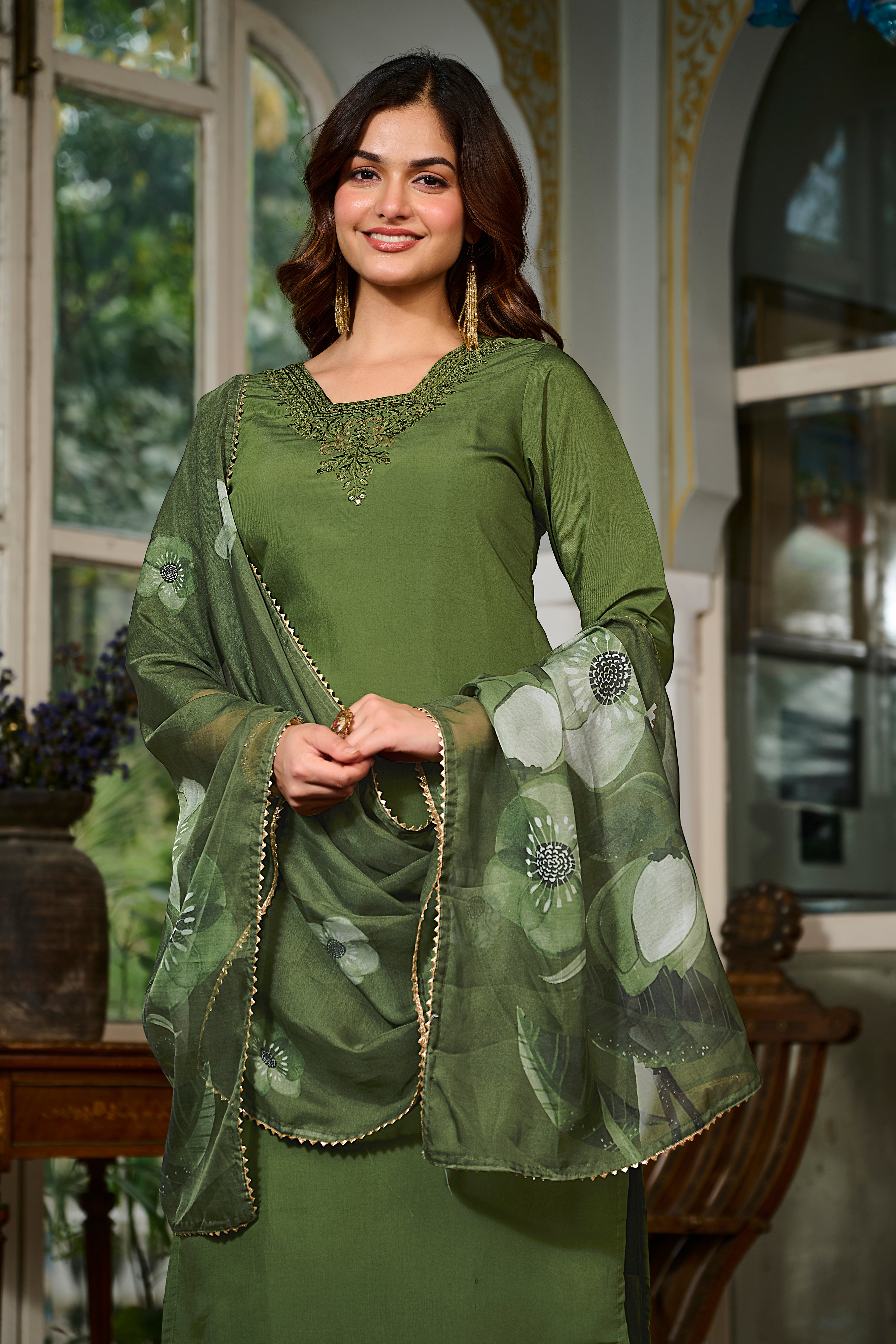 Frontal view of the model in the TRENDBUY green embroidered Viscose Chanderi kurta set, smiling and showcasing the complete festive look