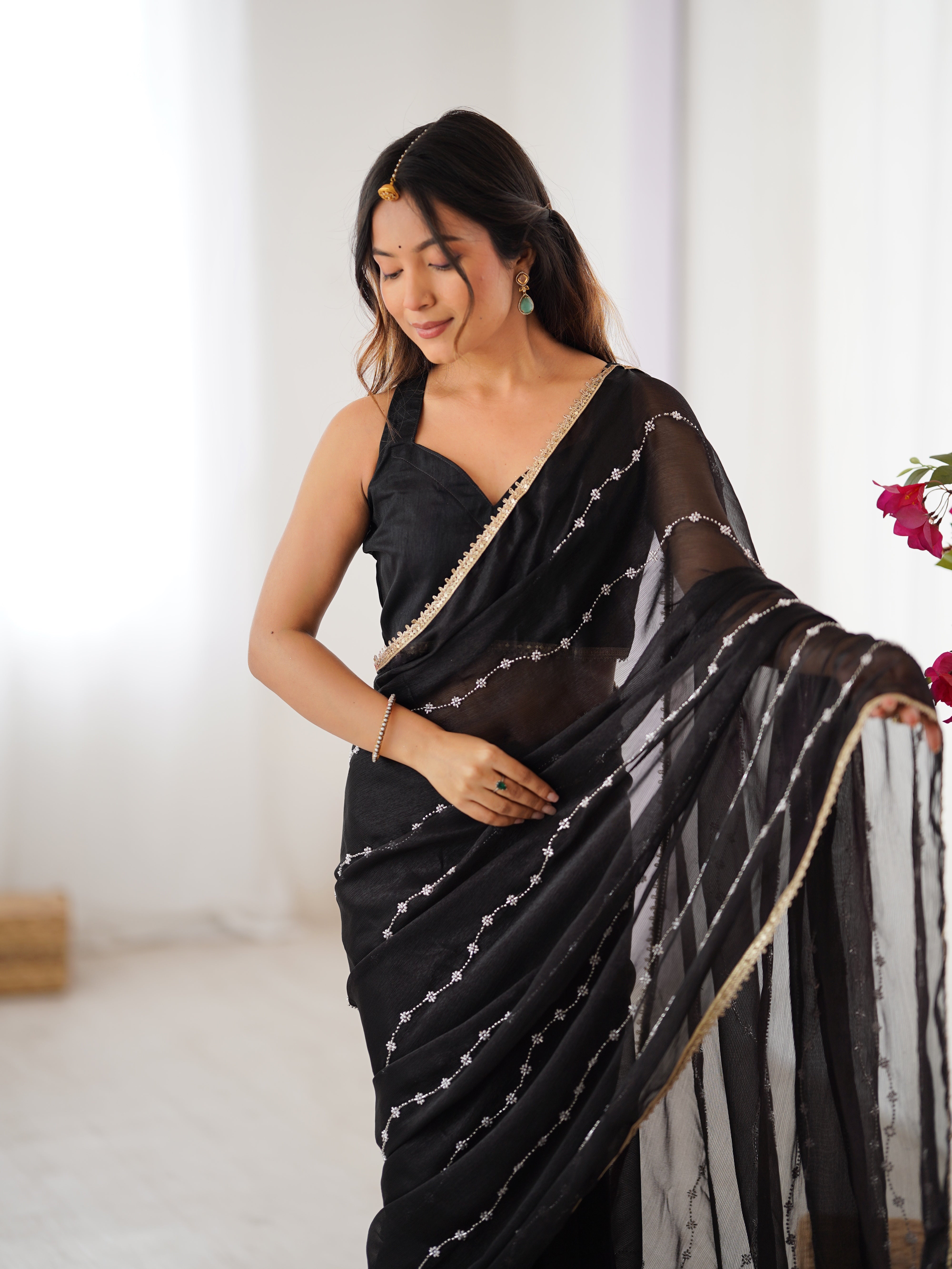 Full length studio shot of model in Black Sitara Fabric Saree, showcasing overall style.