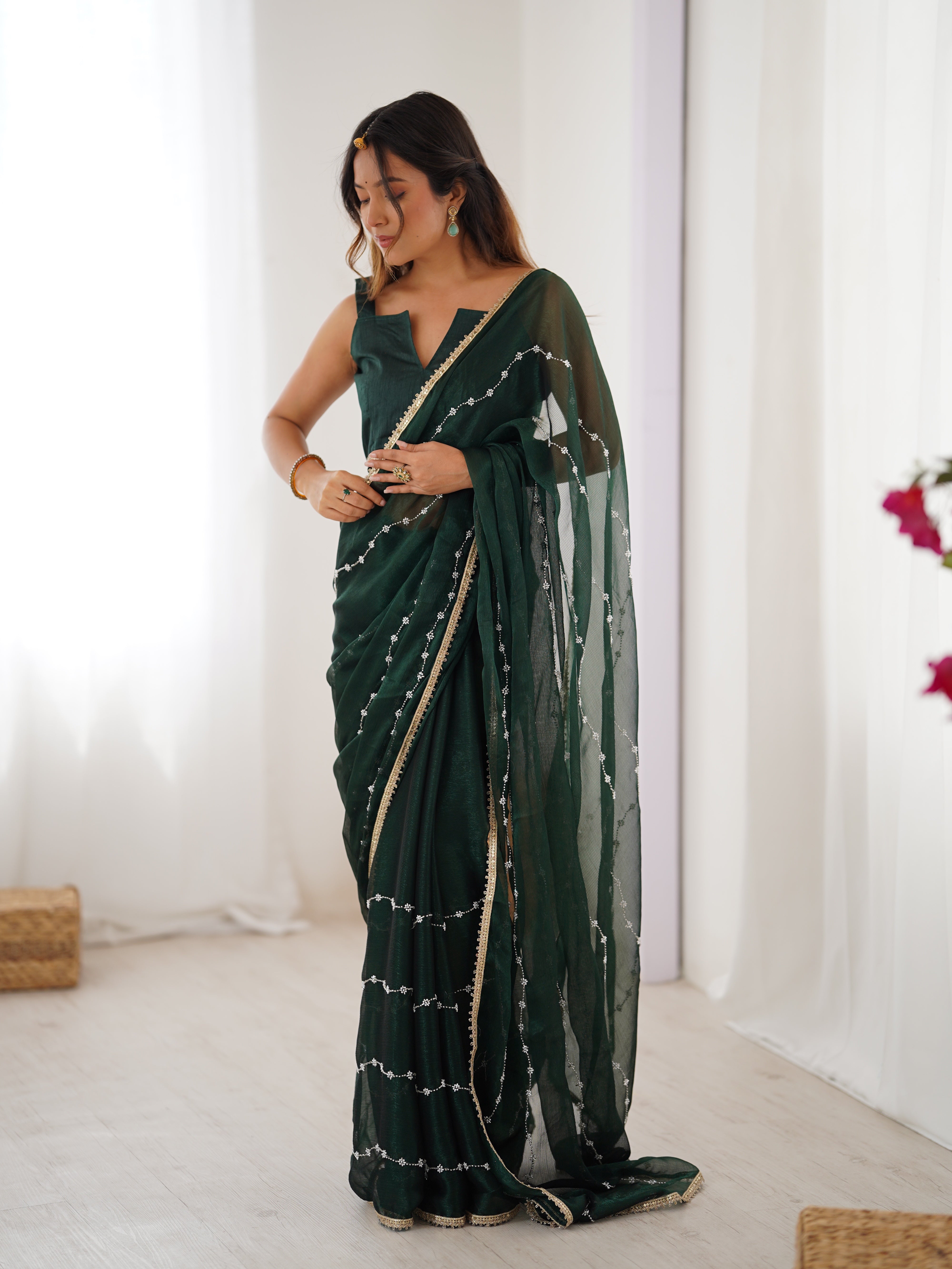 Green Sitara Fabric Saree with sequin embroidery, elegant model full length front view.
