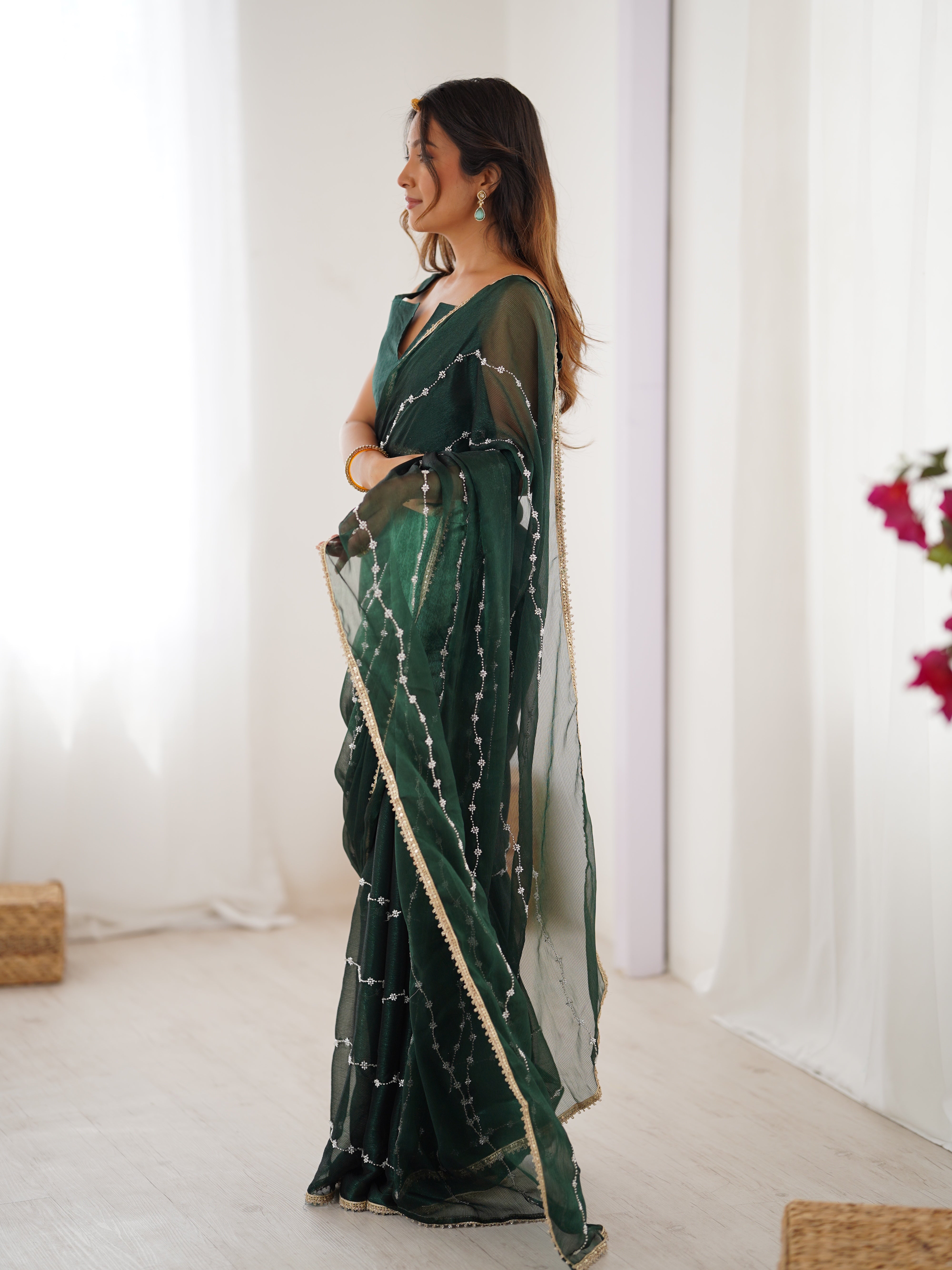 Full length studio shot of model in Green Sitara Fabric Saree, showcasing overall style.