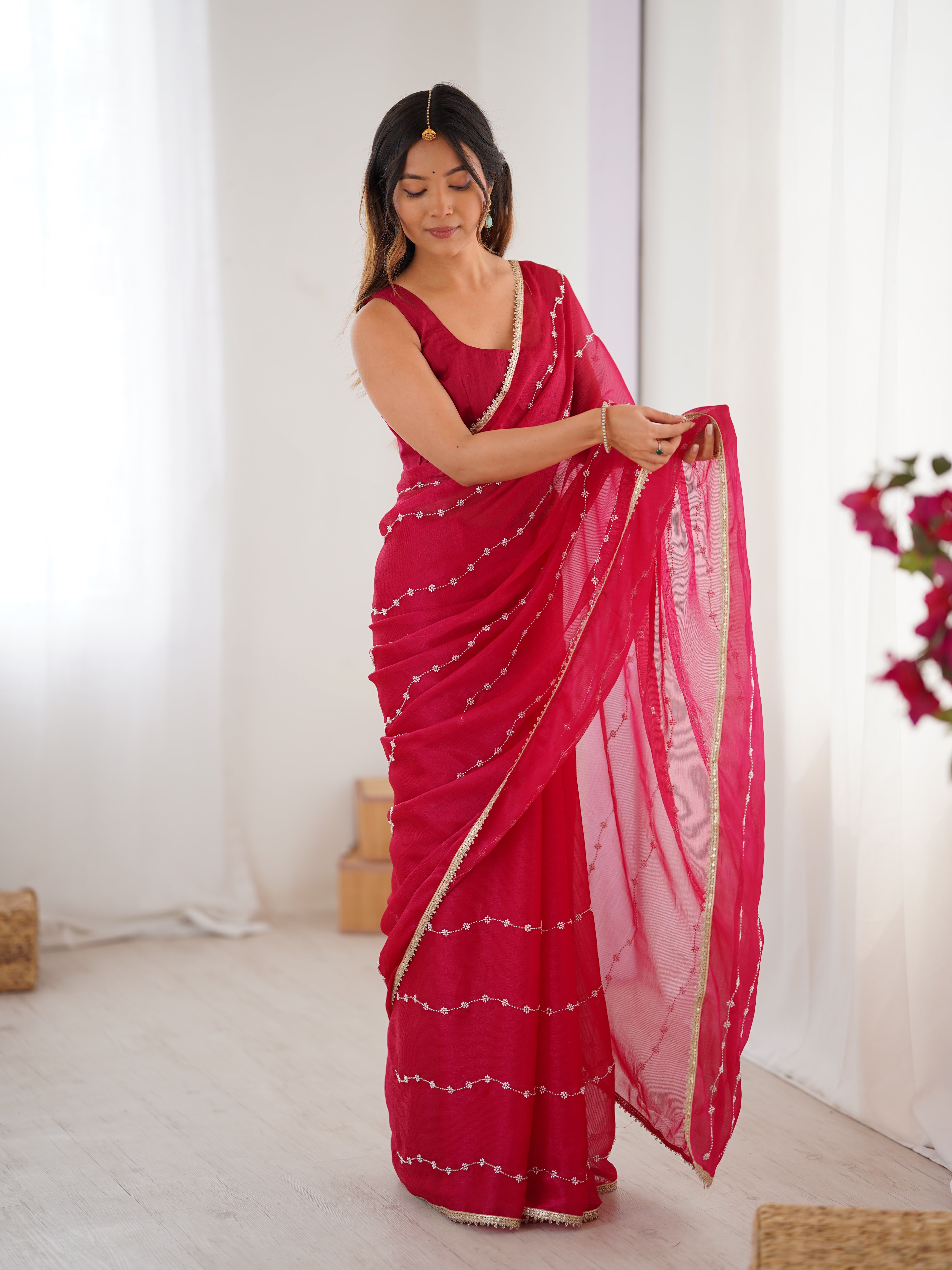 Pink Sitara Fabric Saree with sequin embroidery, elegant model full length front view.