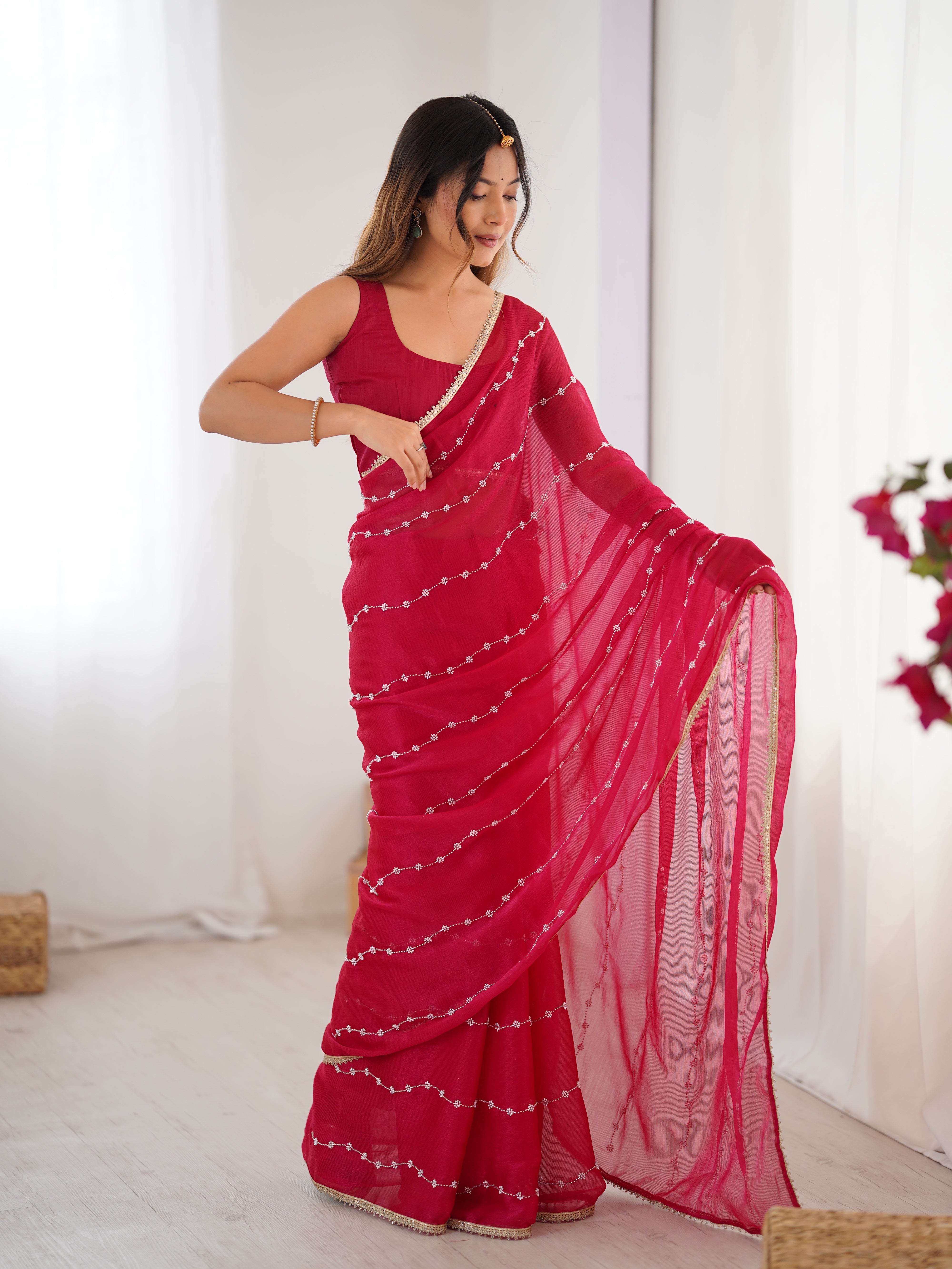 Graceful movement of Pink Sitara Saree, with flowing pallu and shimmering sequin design.