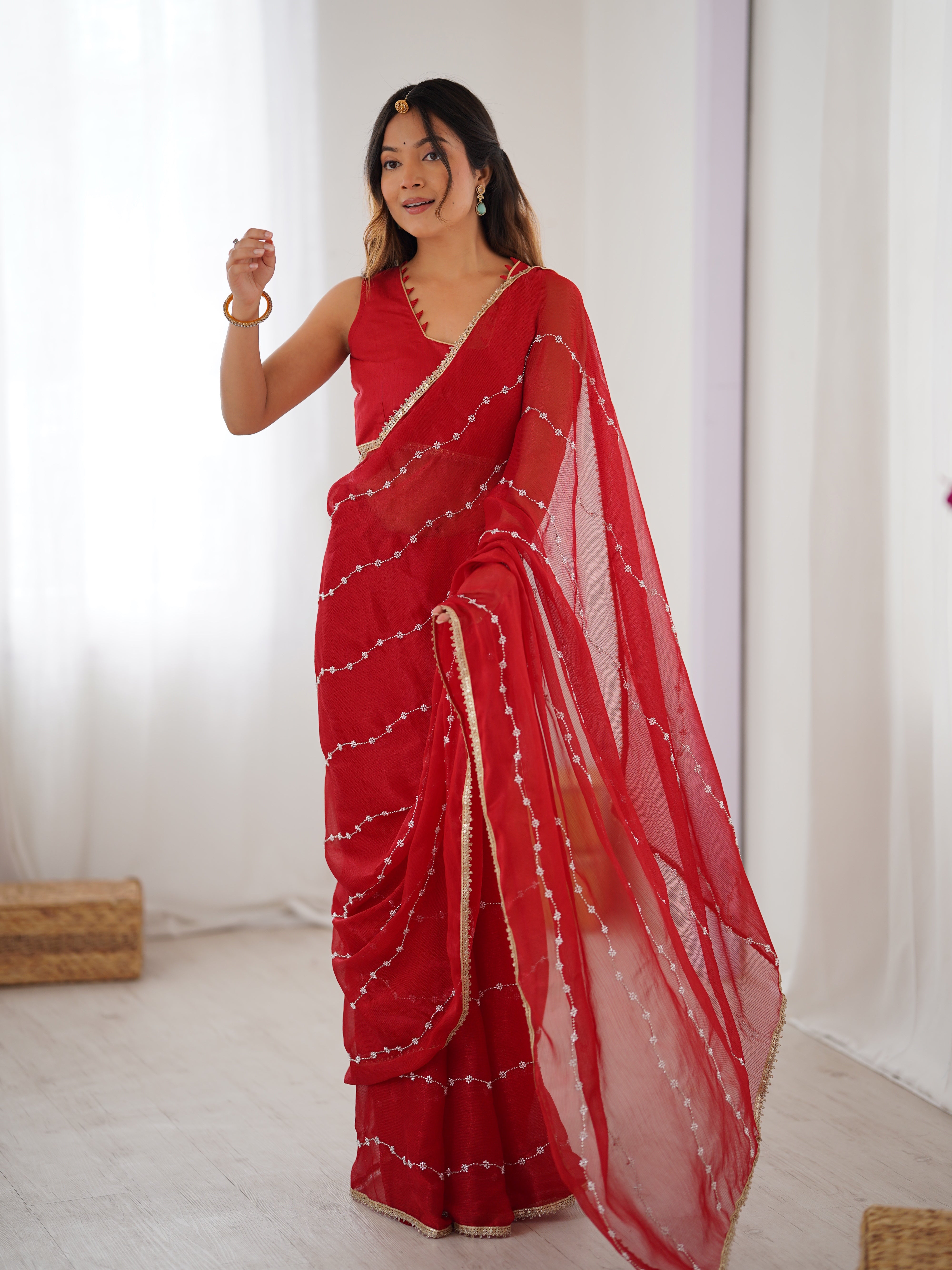 Red Sitara Fabric Saree with sequin embroidery, elegant model full length front view.
