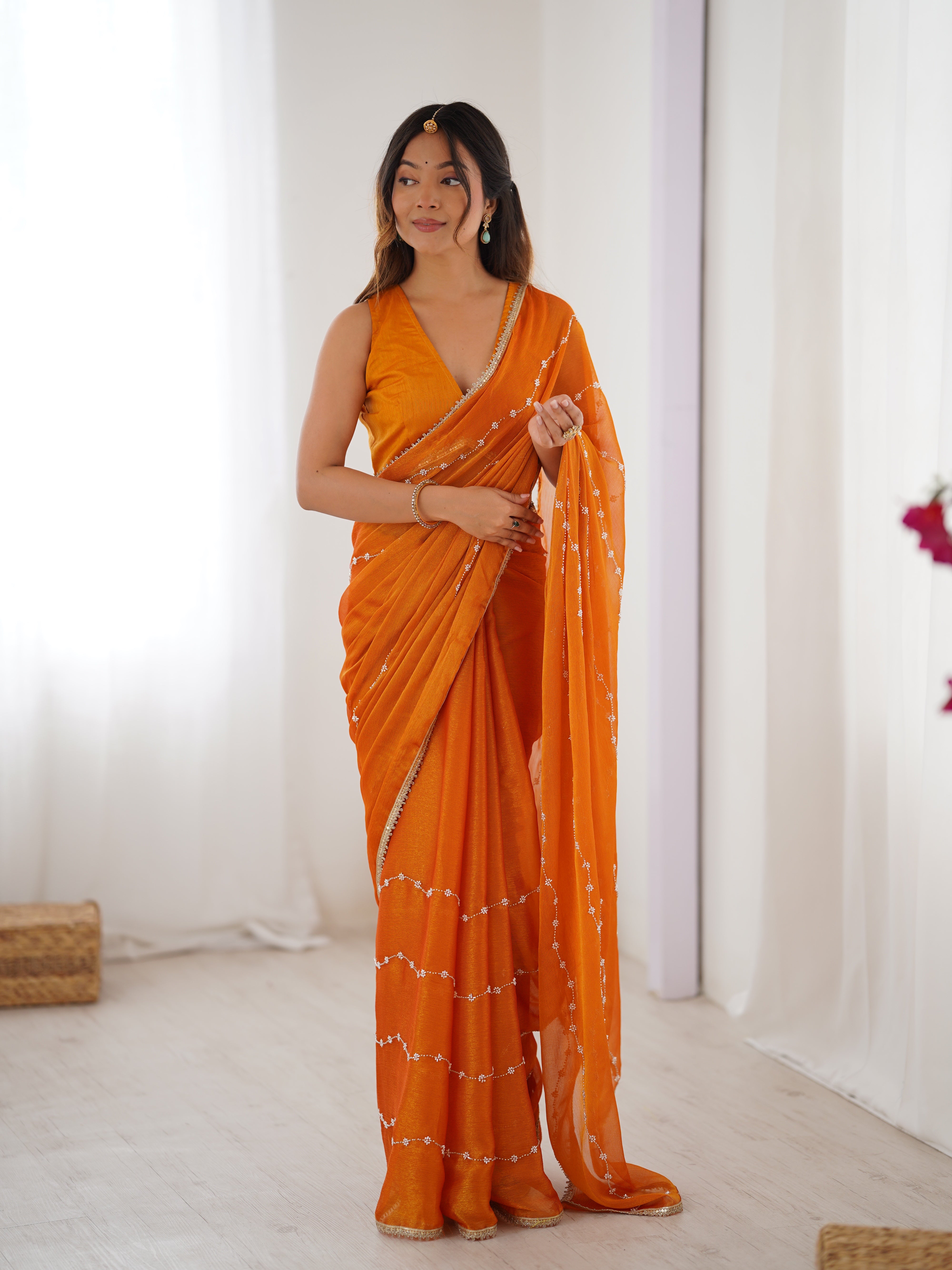 Yellow Sitara Fabric Saree with sequin embroidery, elegant model full length front view.