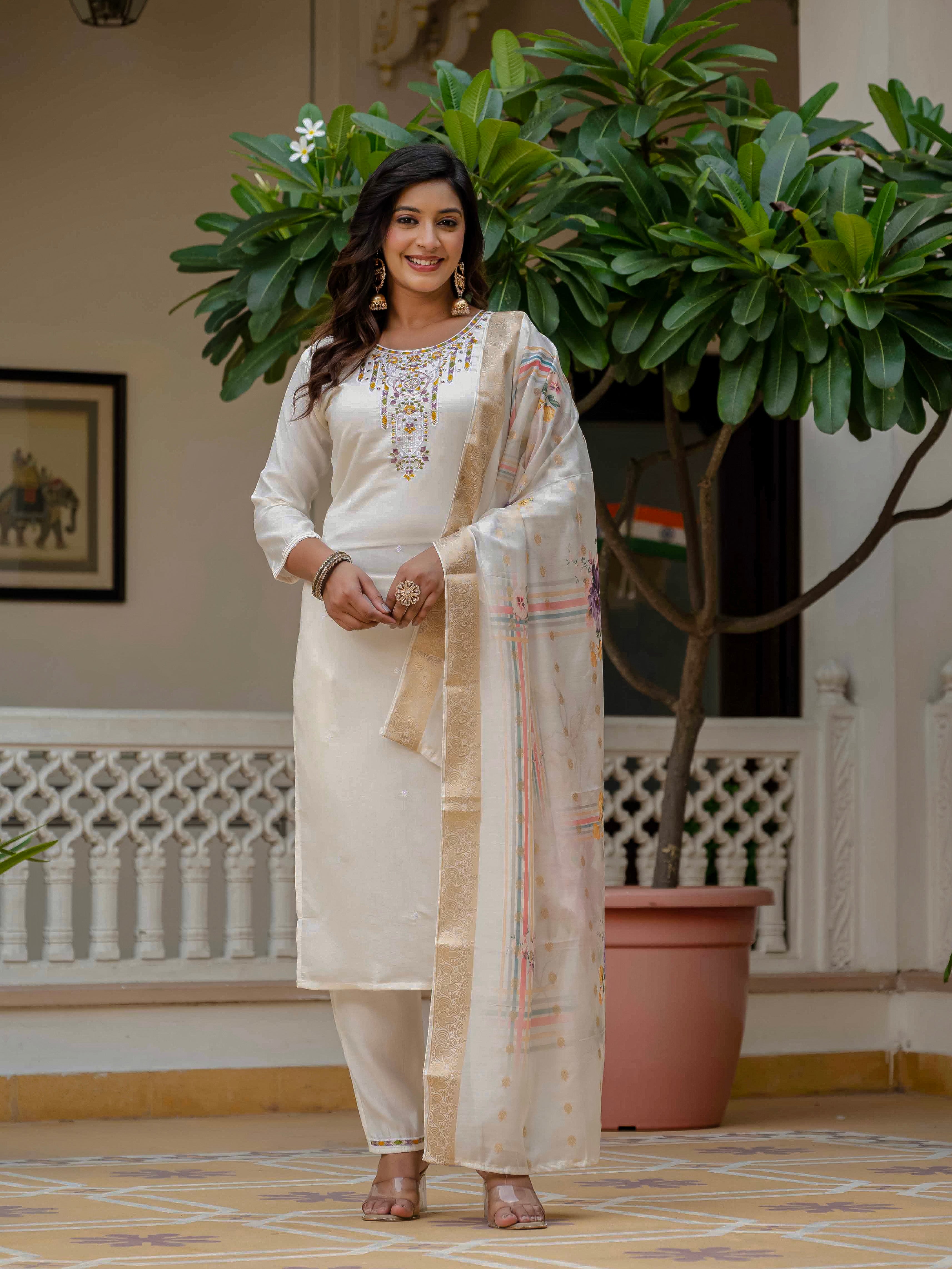 Smiling model posing in full length with TRENDBUY WF-DIVA Off White Kurta Pant Dupatta Set
