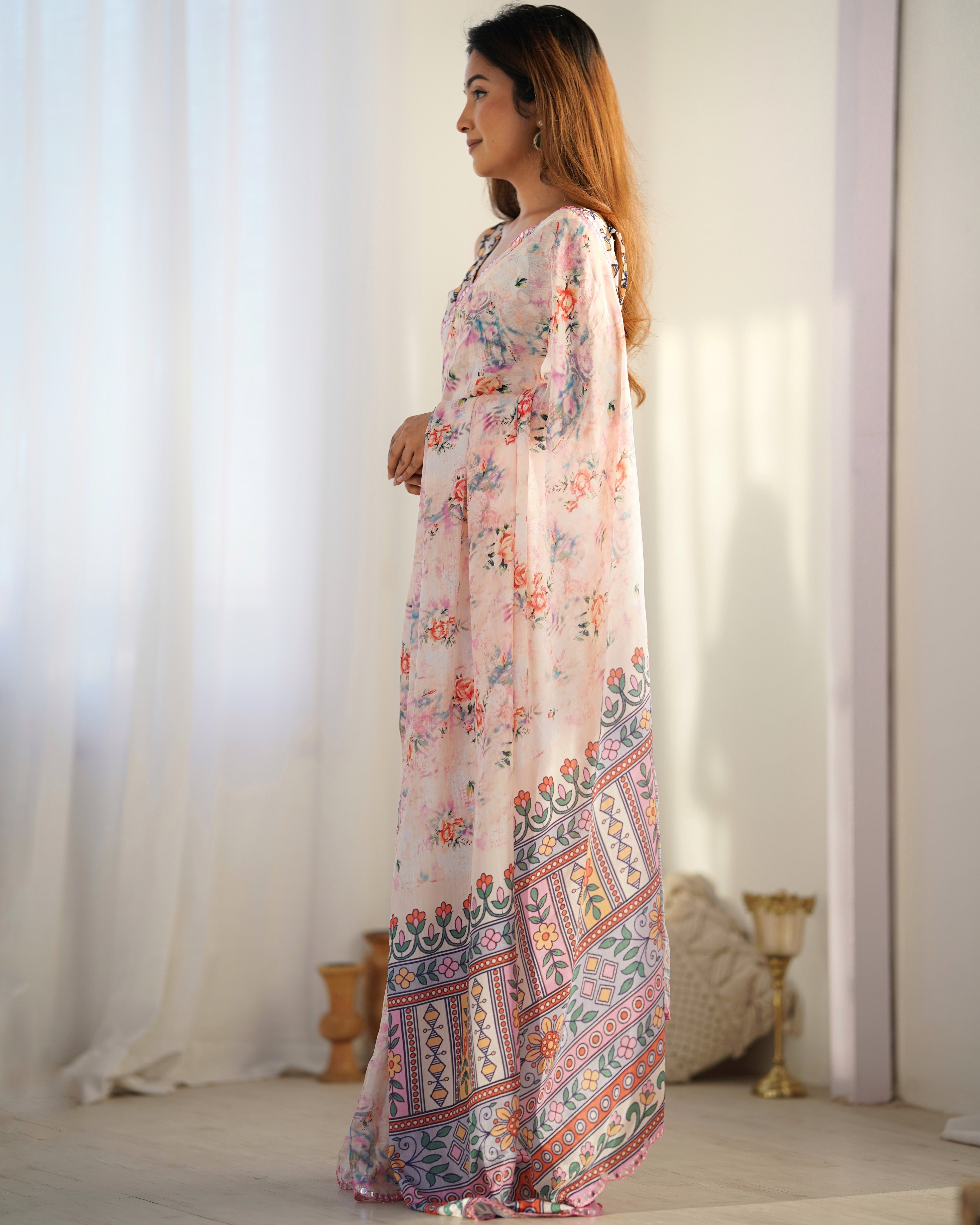 Heavy Chinnon Saree with elegant print and Kutchi work mirror lace border