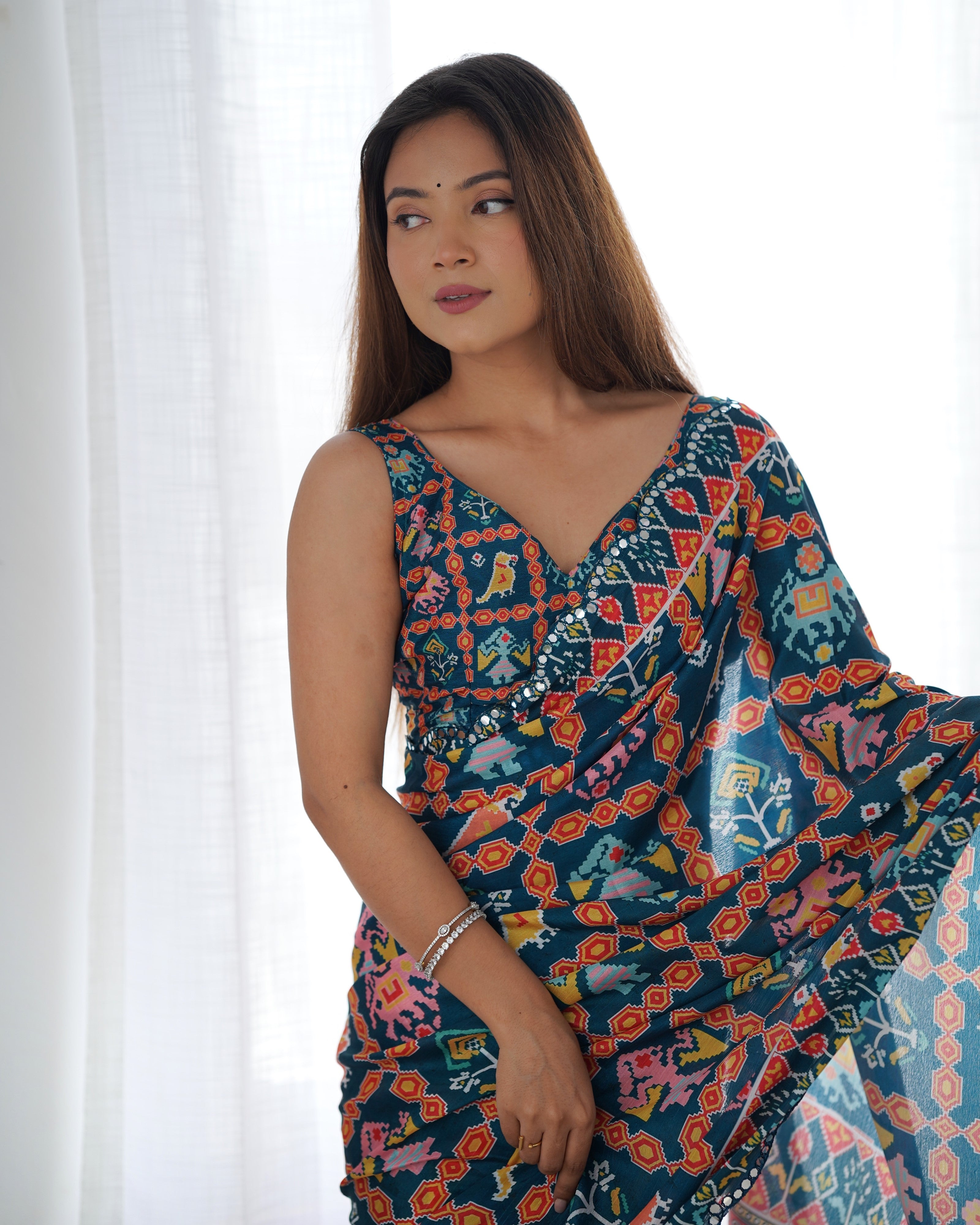 TRENDBUY DVS-12 Heavy Chinnon Saree with vibrant print and Kutchi mirror work lace border