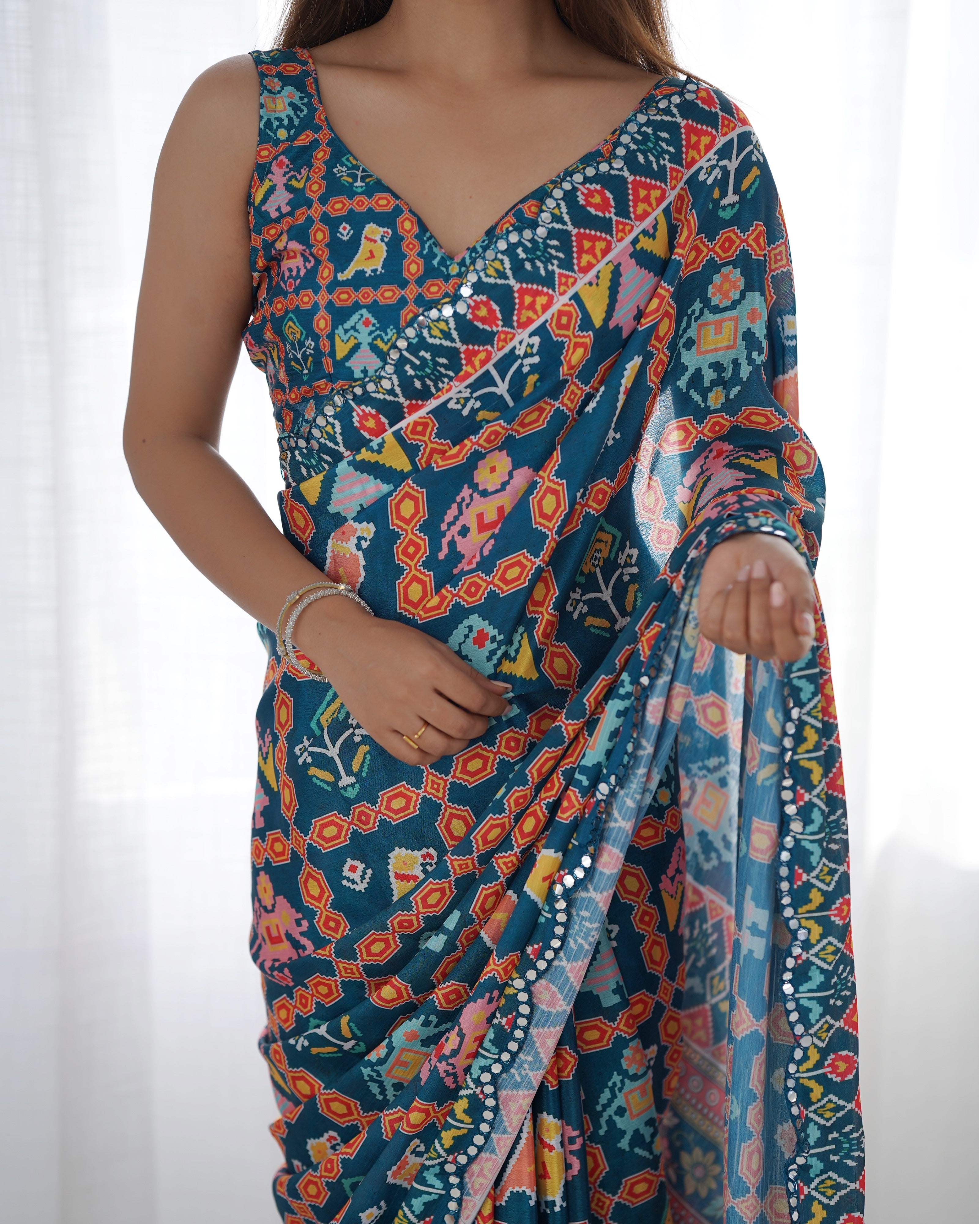 TRENDBUY DVS-12 Heavy Chinnon Saree with vibrant print and Kutchi mirror work lace border detail