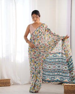 TRENDBUY Exclusive Heavy Chinnon Saree with Beautiful Kutchi Work Mirror Lace Border