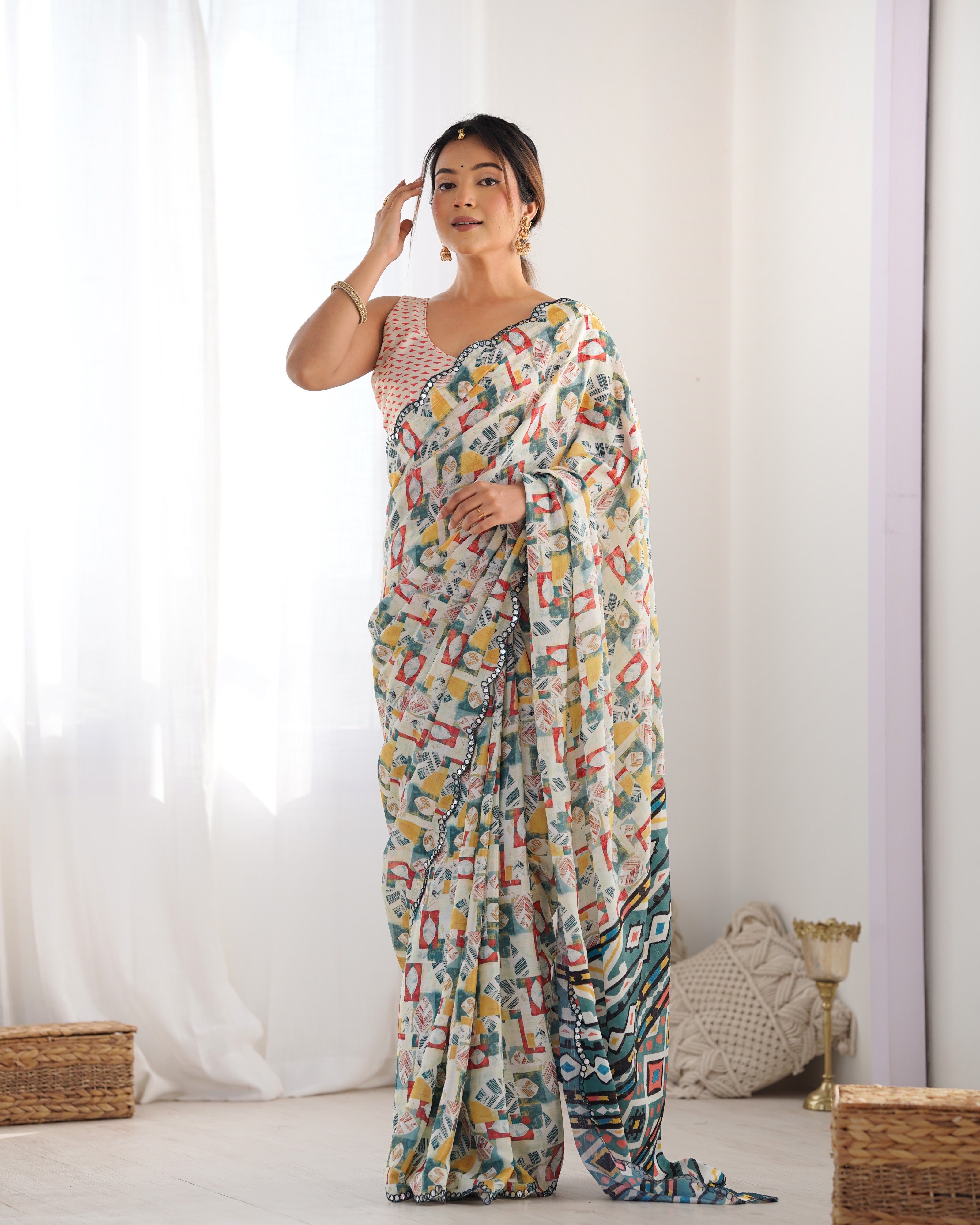 TRENDBUY exclusive heavy Chinnon saree with beautiful Kutchi work mirror lace border