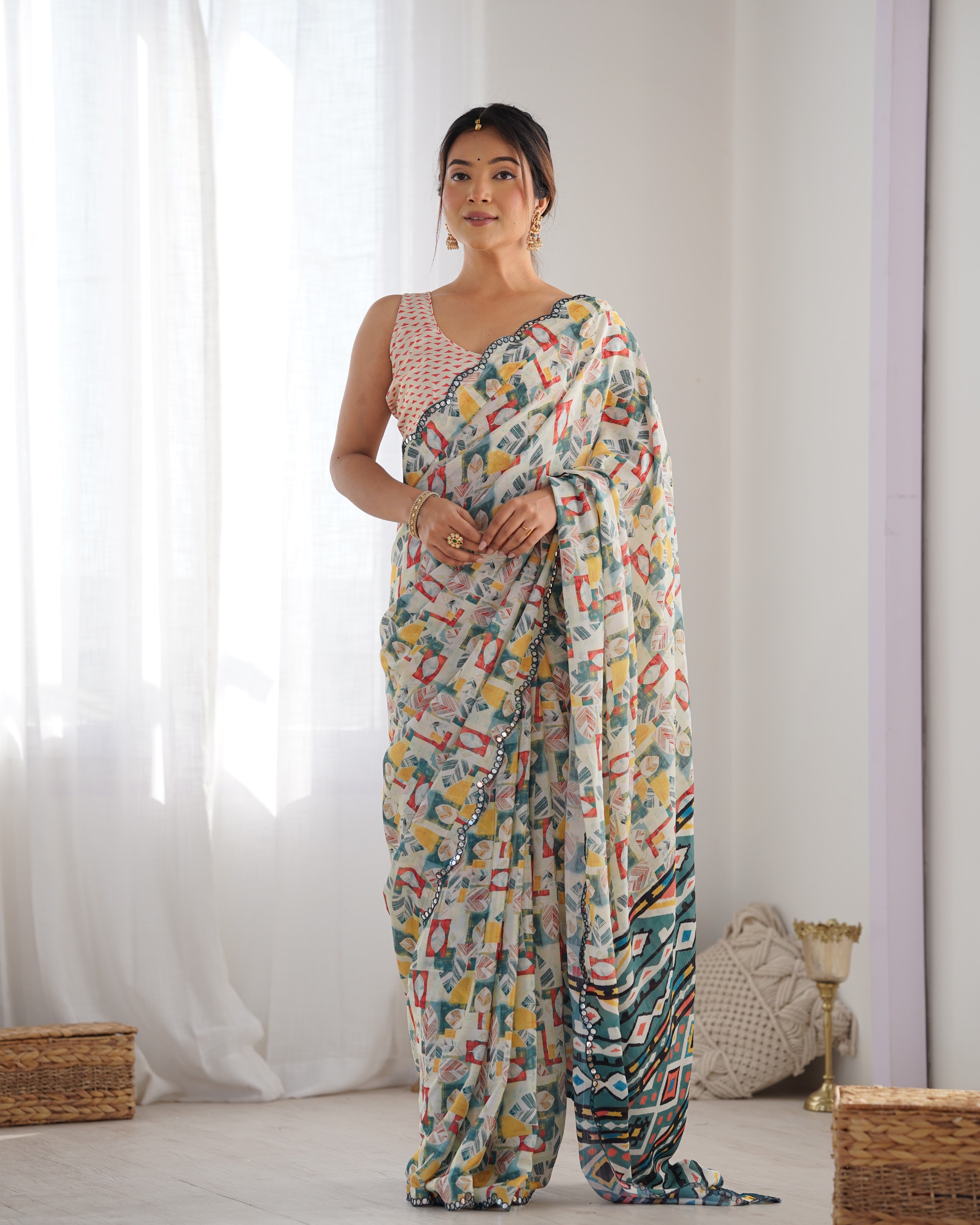 TRENDBUY Exclusive Heavy Chinnon Saree with beautiful Kutchi work and mirror lace border