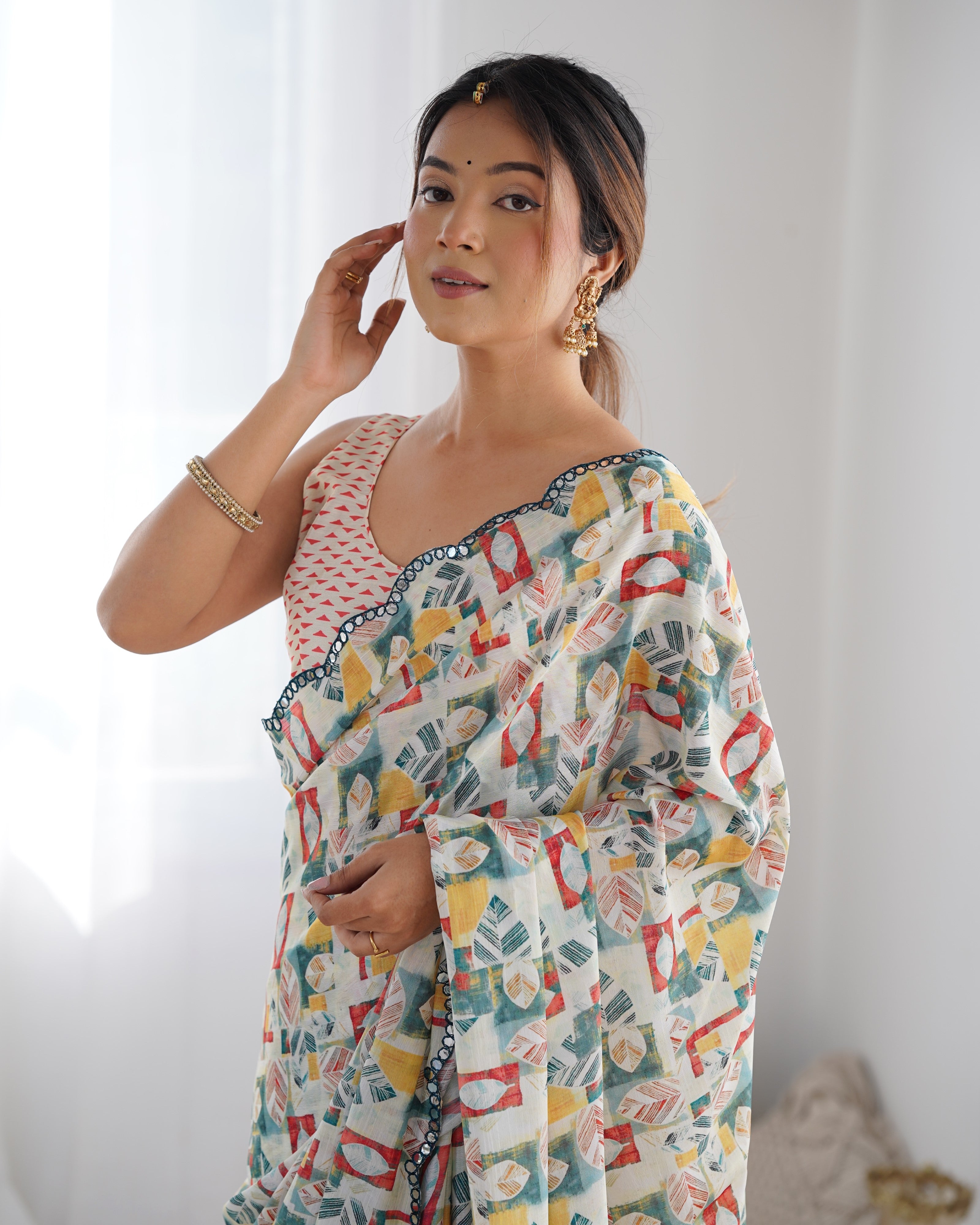 Heavy Chinnon Saree with beautiful Kutchi work and mirror lace border detail