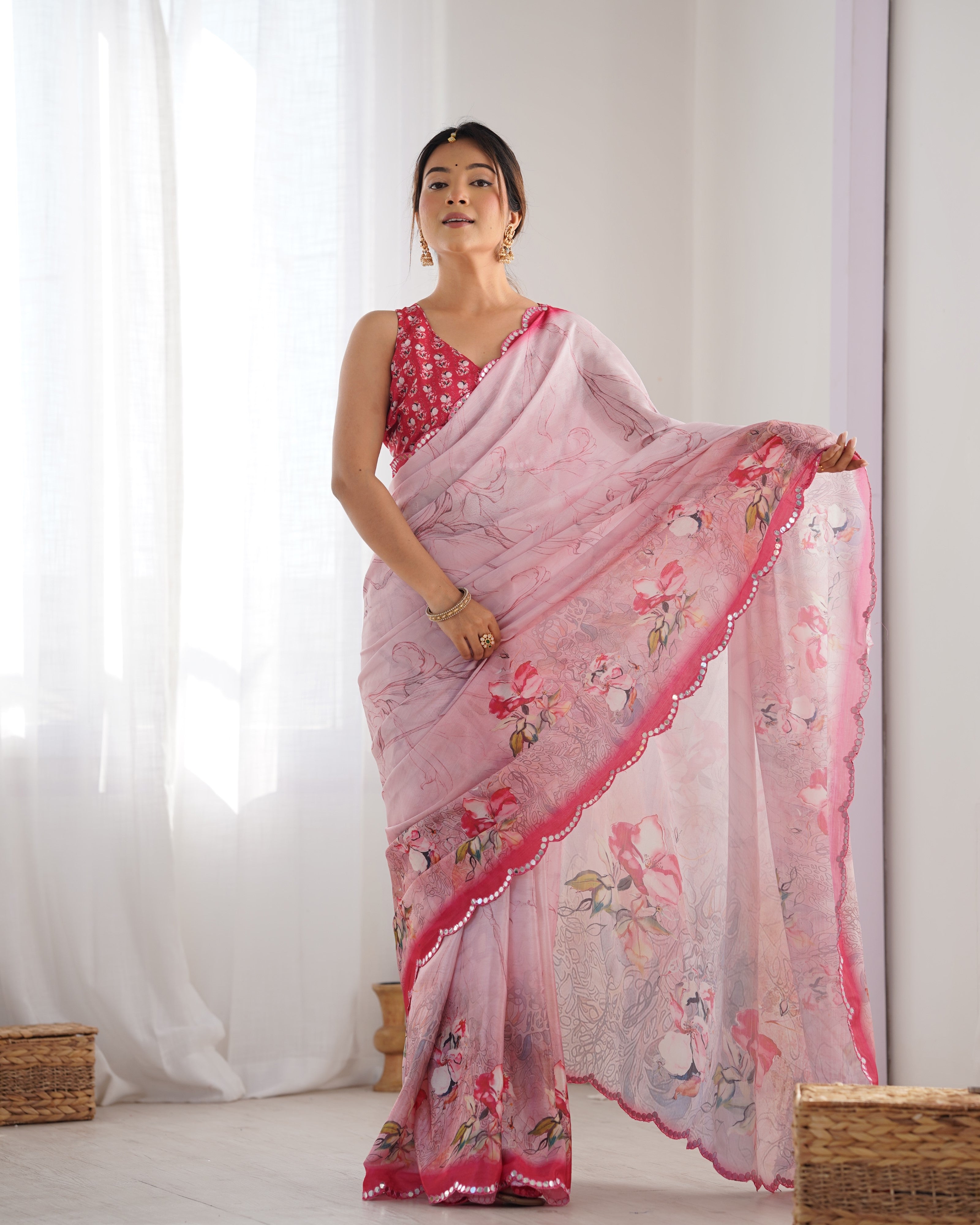 Elegant Heavy Chinnon Saree with Kutchi mirror work & floral print blouse.
