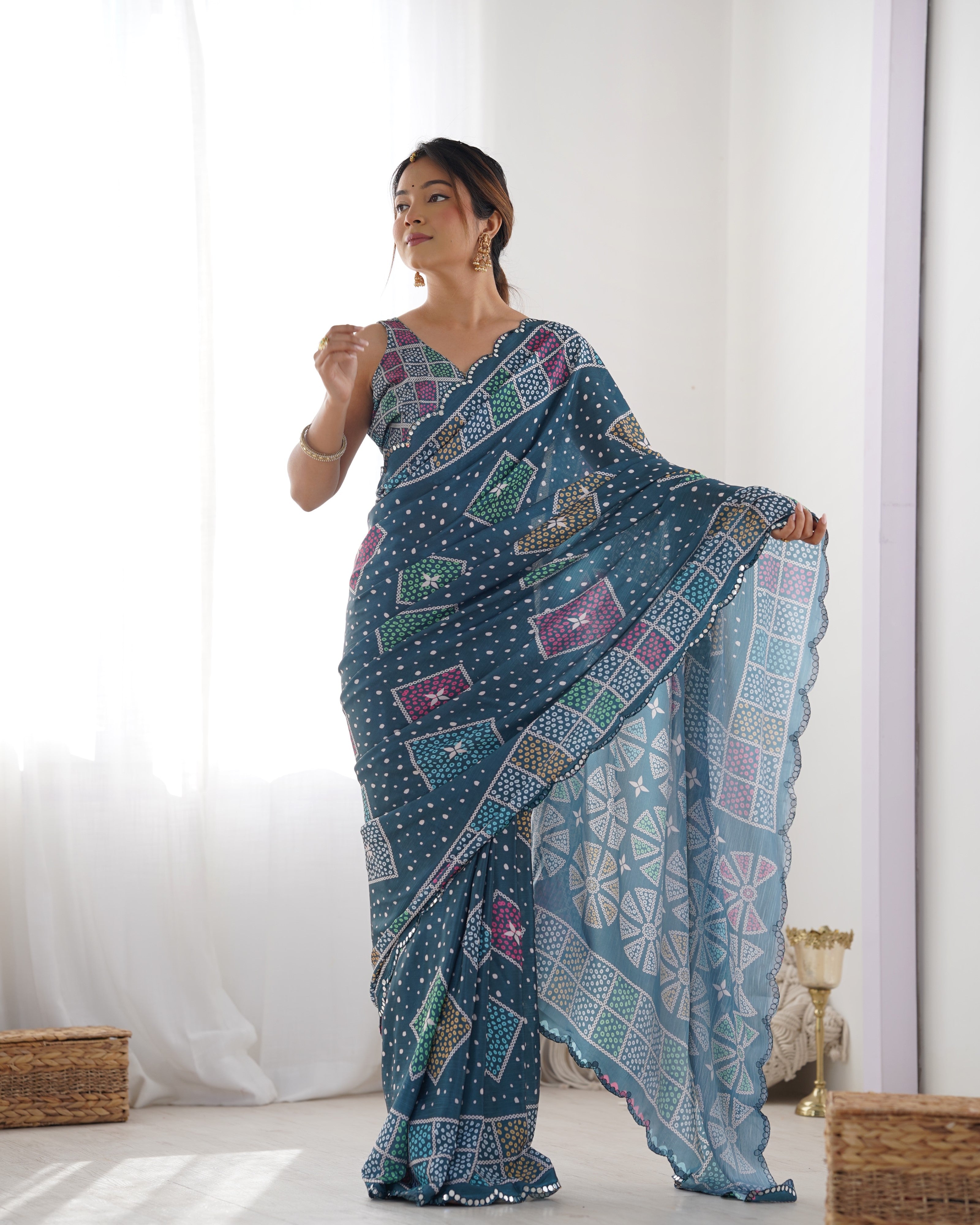 Elegant Teal Heavy Chinnon Saree with Kutchi Mirror Work Lace Border