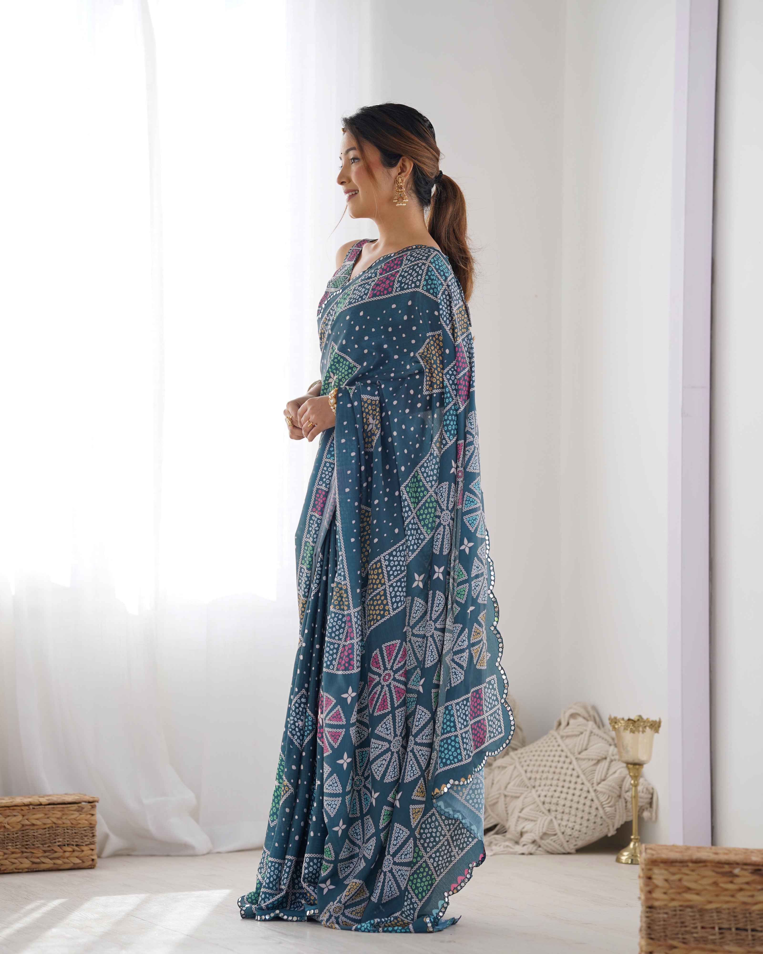 Elegant Teal Heavy Chinnon Saree with Kutchi Mirror Work Lace Border