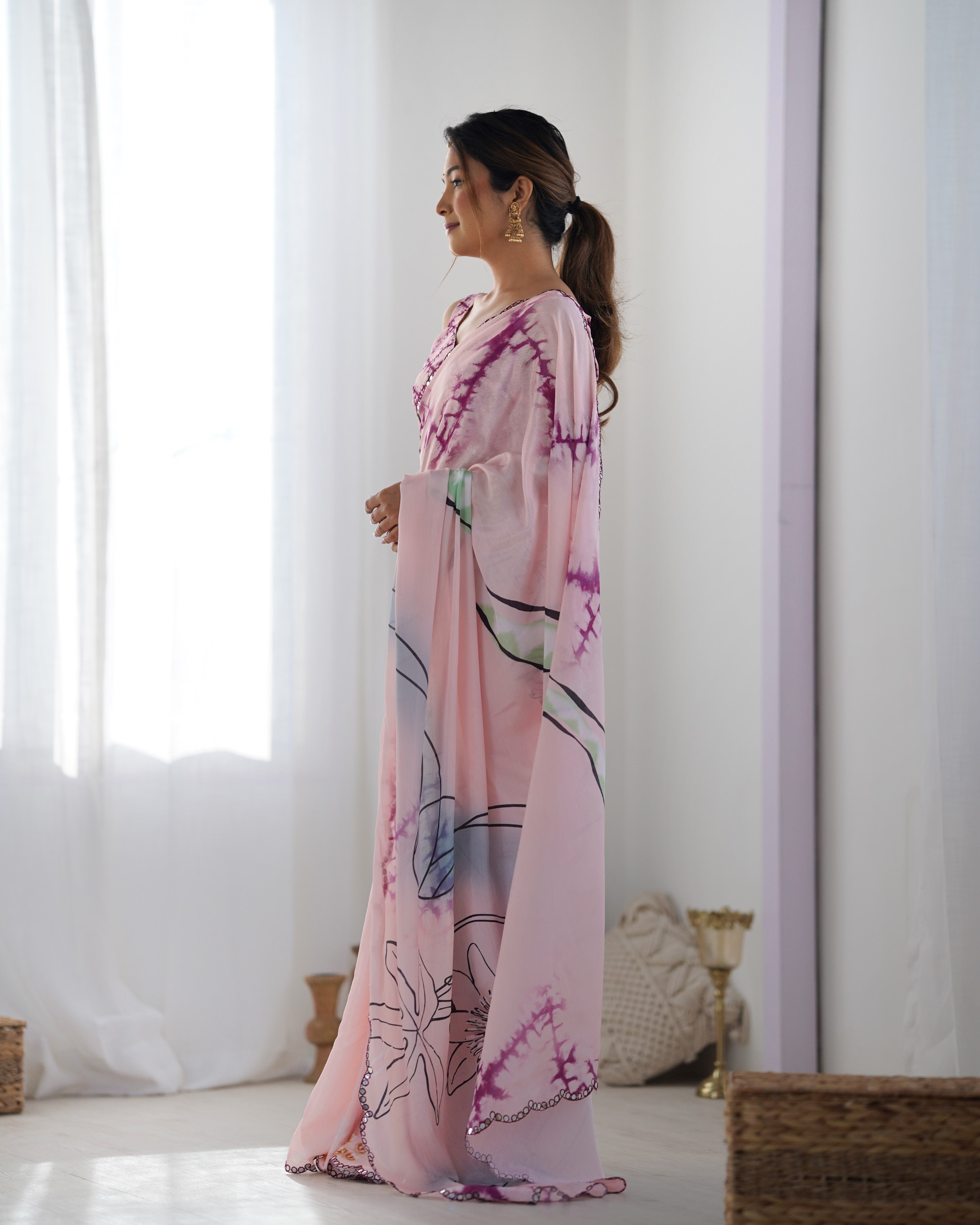 Elegant Heavy Chinnon Saree with Kutchi mirror lace border & printed design