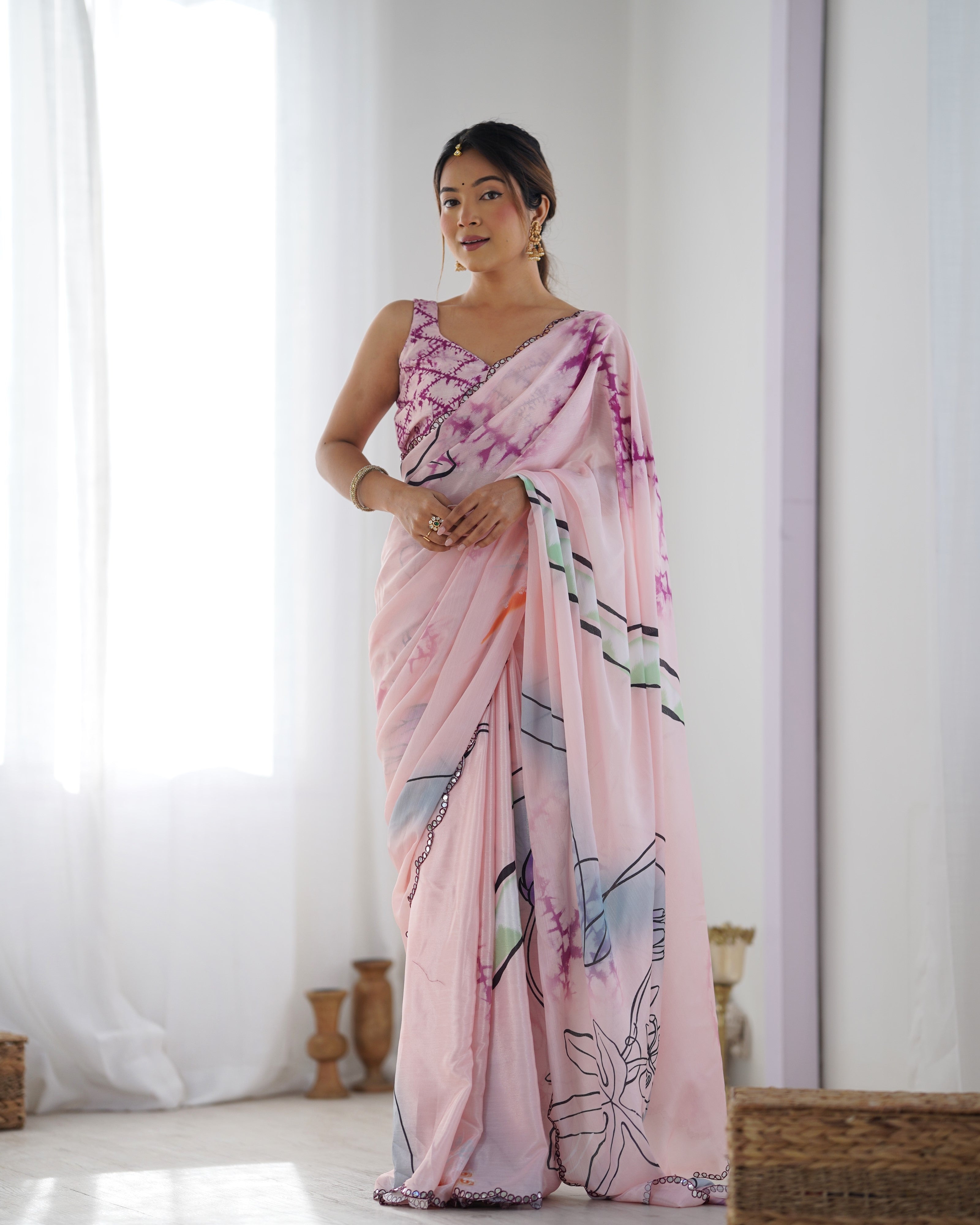 Elegant heavy Chinnon saree with Kutchi mirror lace border and printed design