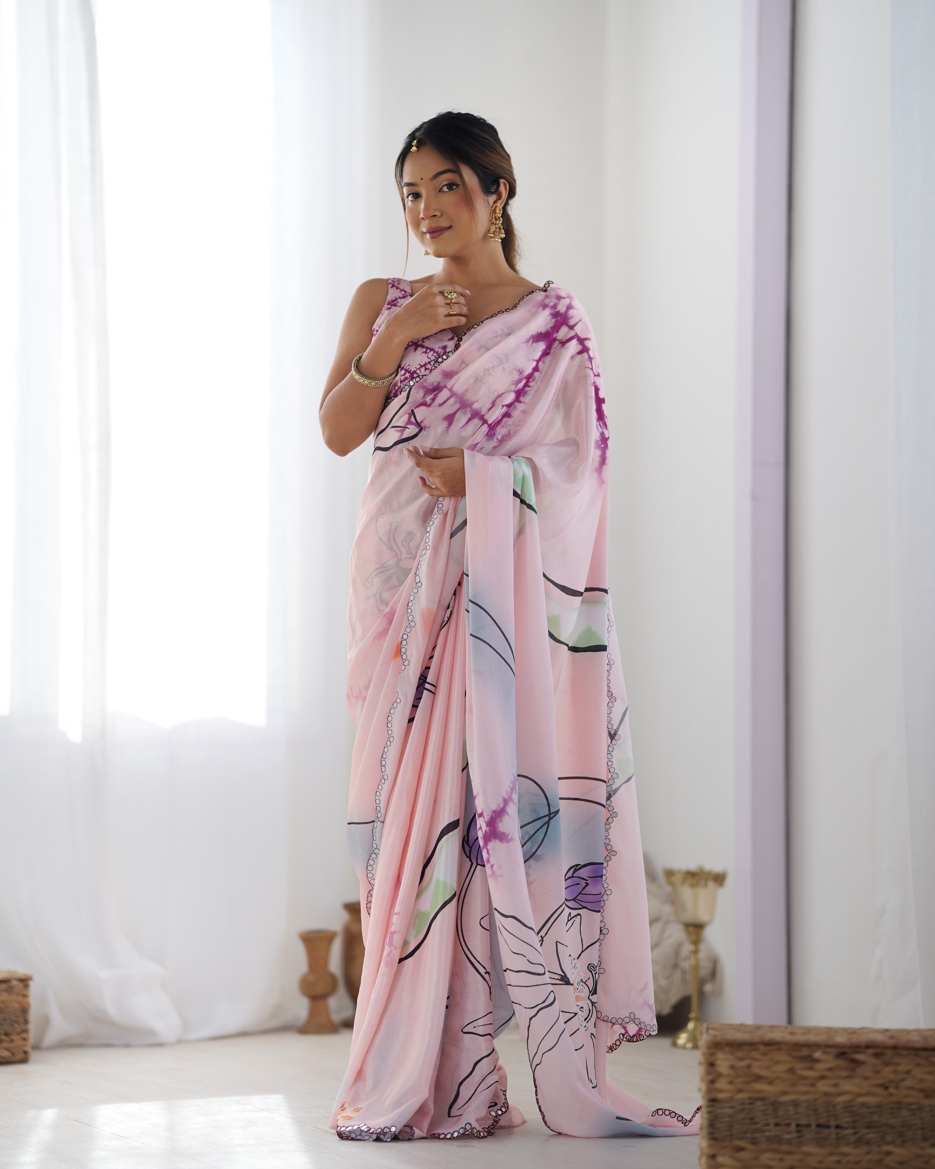 TRENDBUY Elegant Heavy Chinnon Saree with Kutchi Mirror Lace Border and beautiful Printed Design.