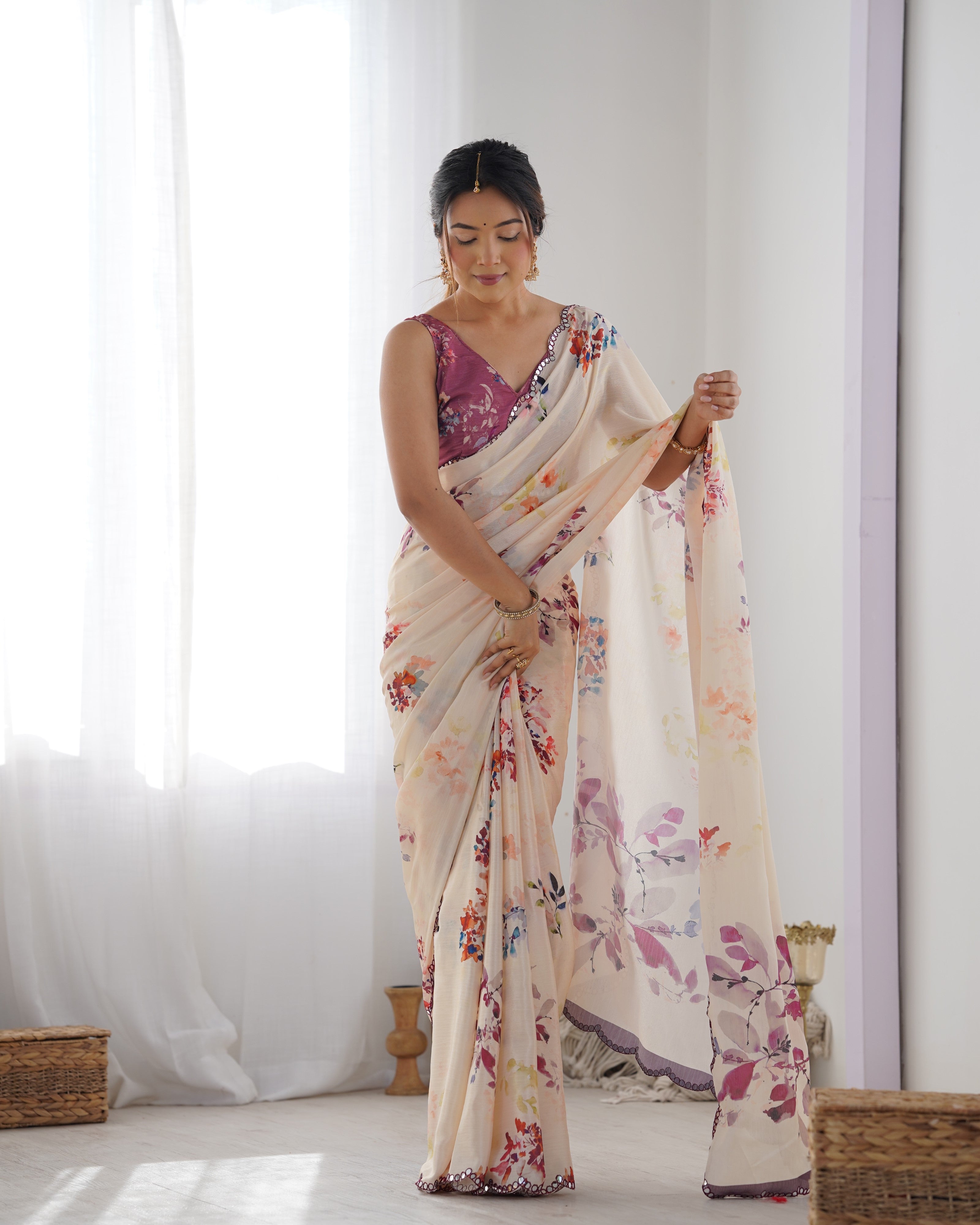 Heavy Chinnon Saree with floral print and Kutchi mirror lace border.