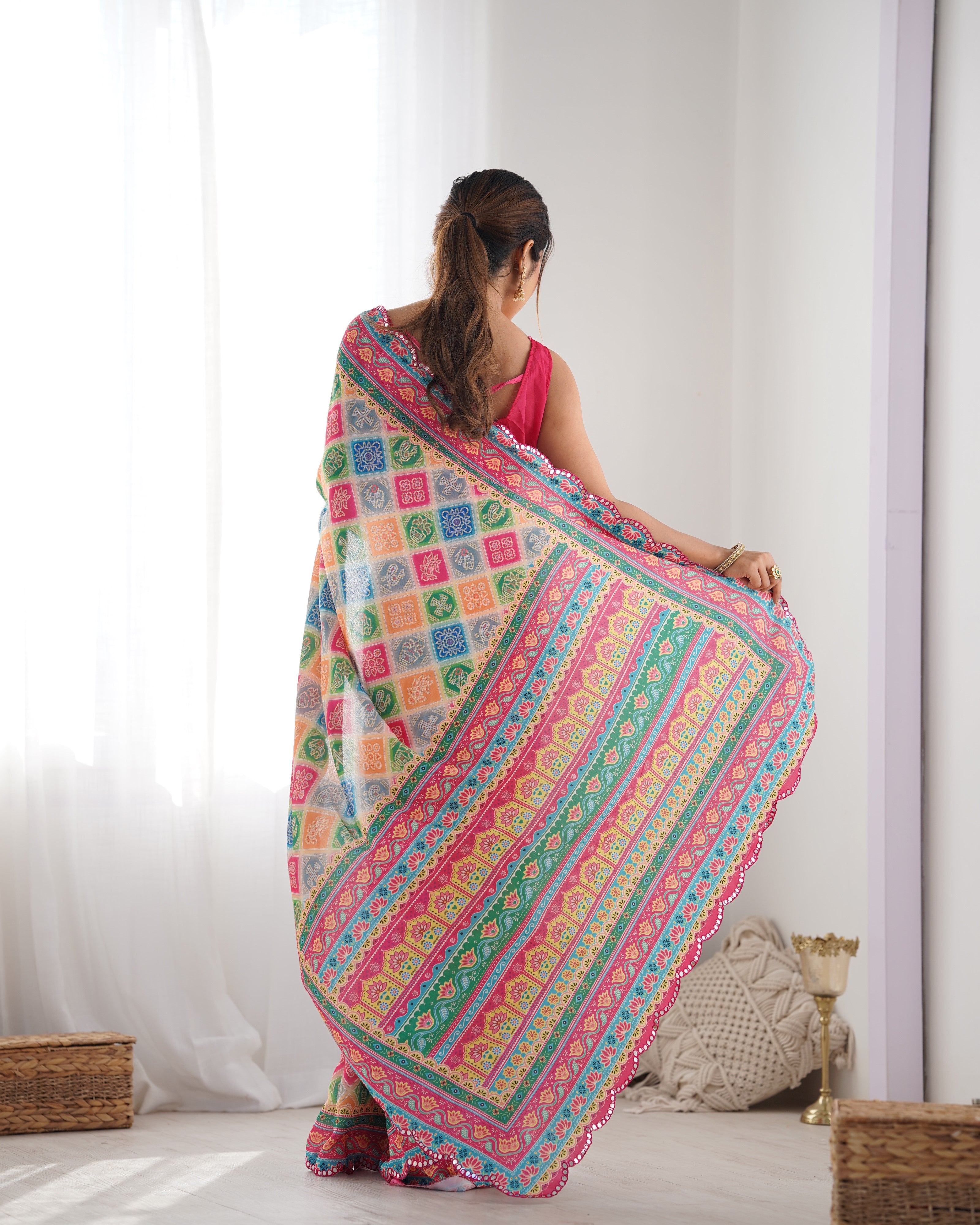 TRENDBUY Heavy Chinnon Saree with vibrant print and intricate Kutchi mirror work border