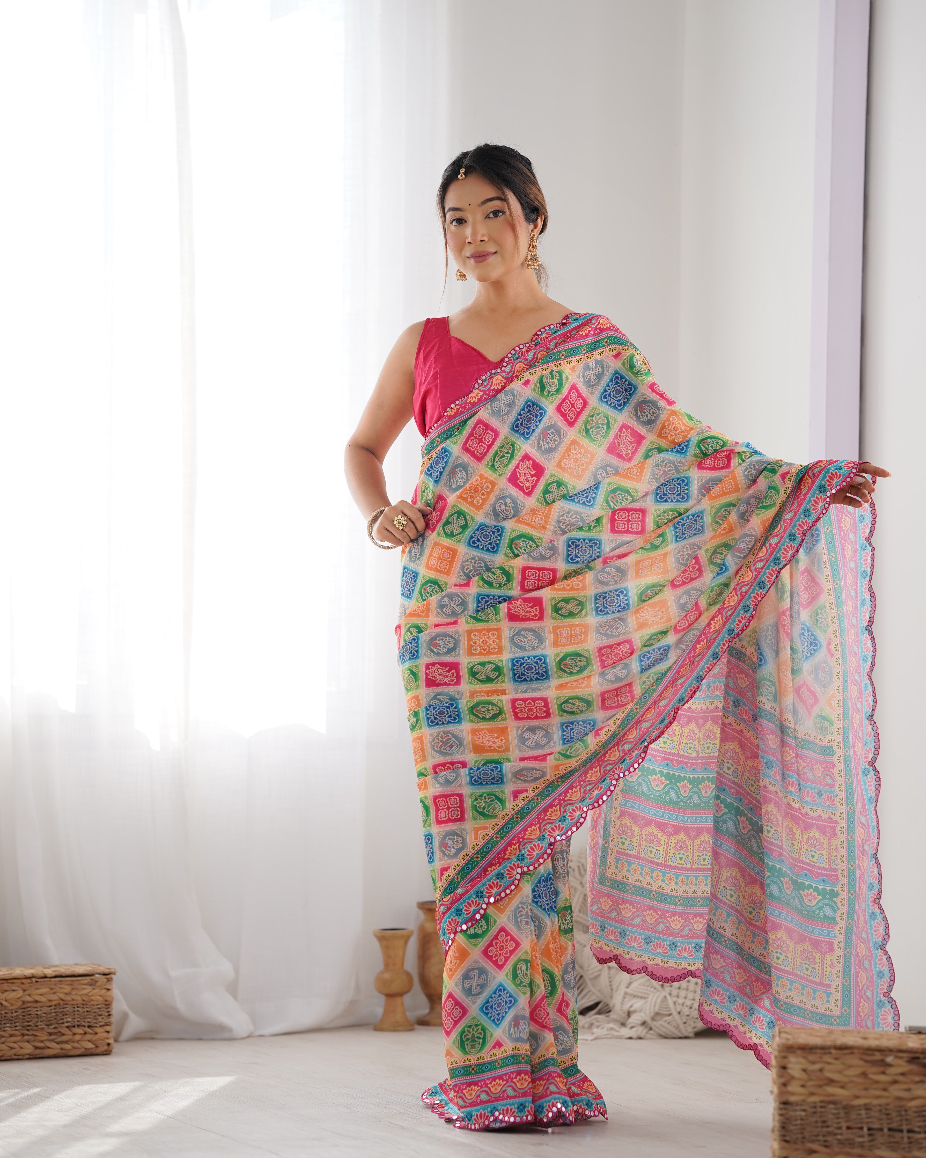 TRENDBUY Heavy Chinnon Saree DVS-20 with vibrant print & detailed Kutchi mirror work border.