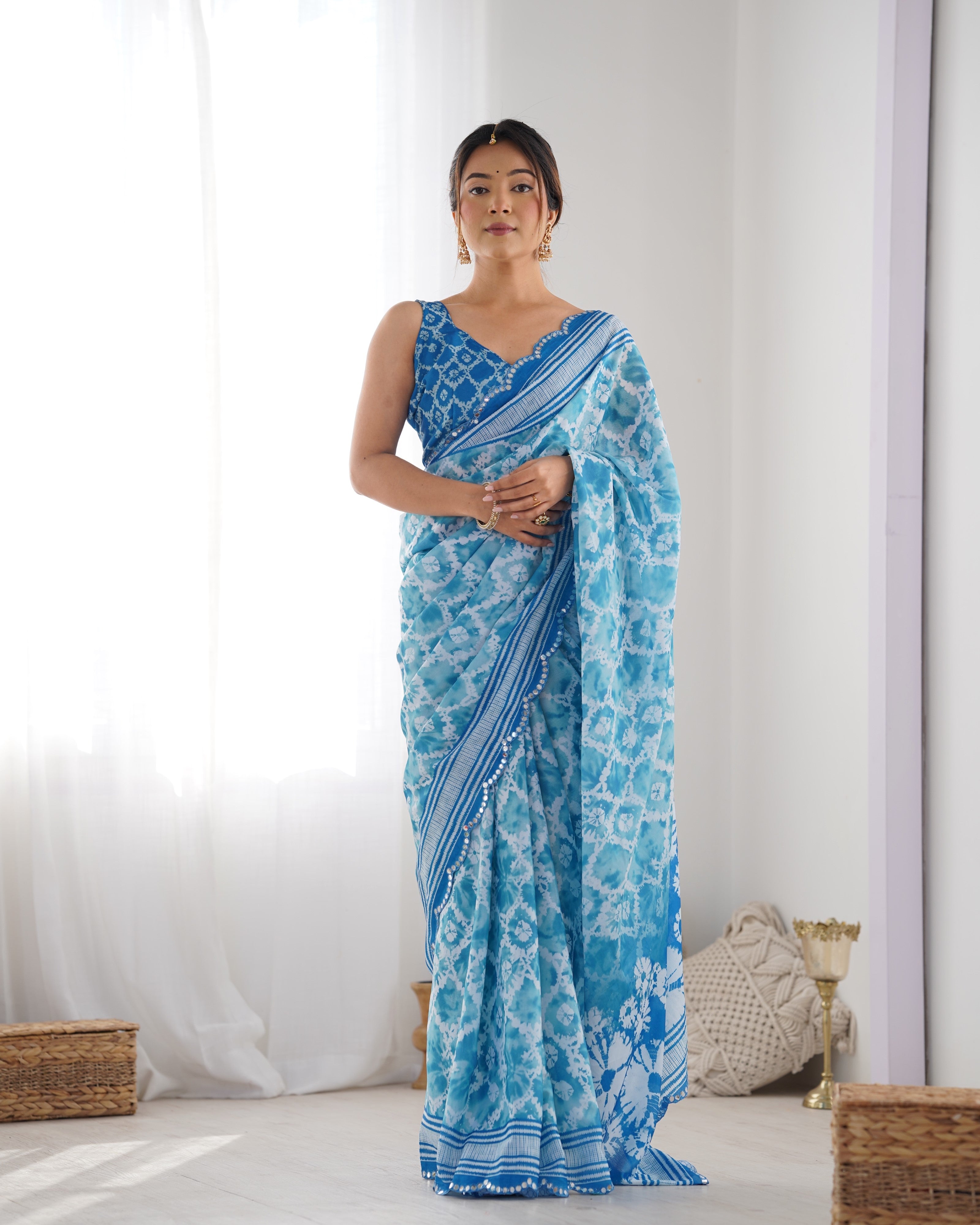 Elegant Blue Chinnon Saree with Kutchi Mirror Work Lace Border