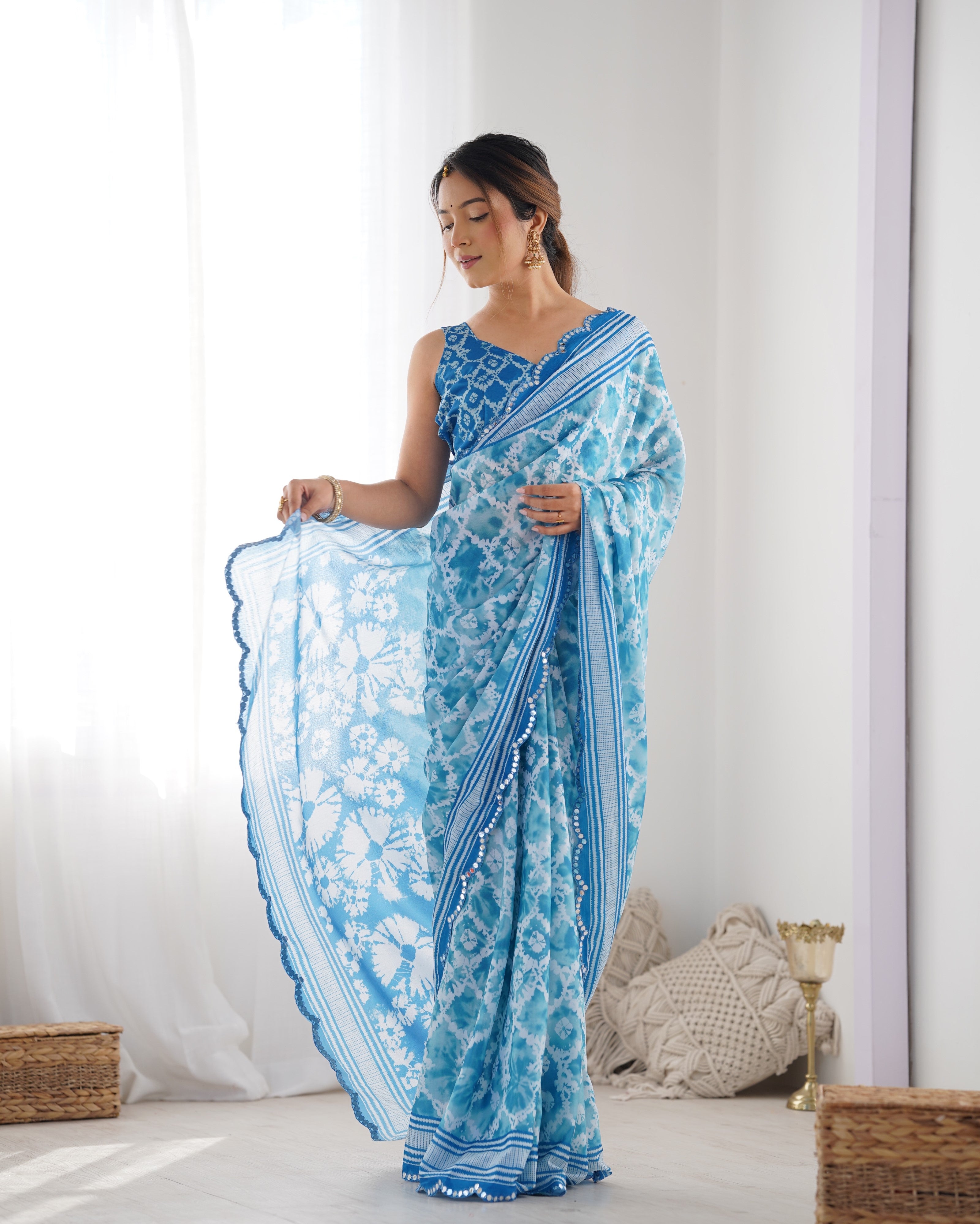 Elegant Blue Chinnon Saree with Kutchi Mirror Work Lace Border and unstitched blouse
