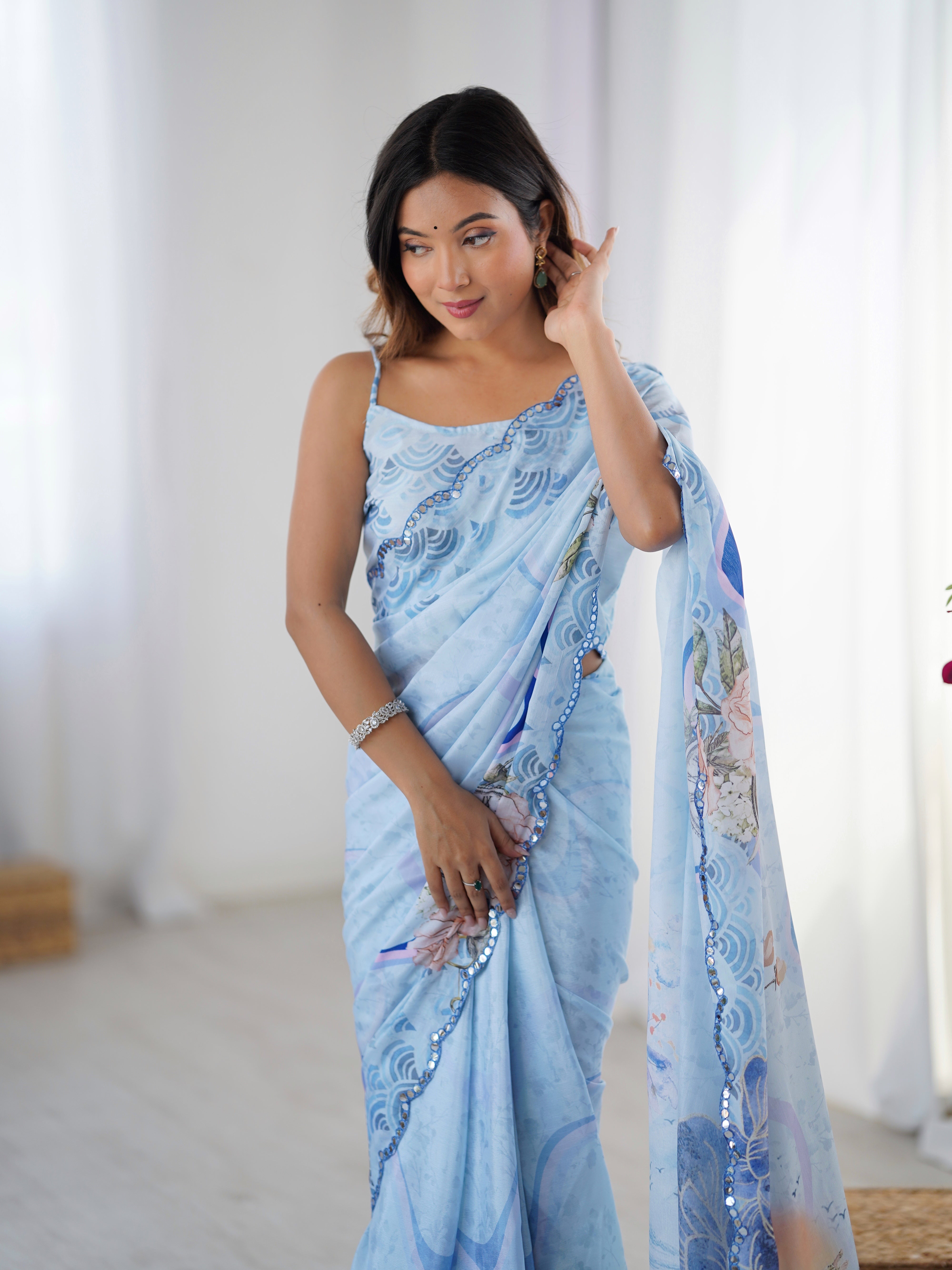 Elegant Sky Blue Chinnon Saree with Kutchi Work Mirror Lace Border