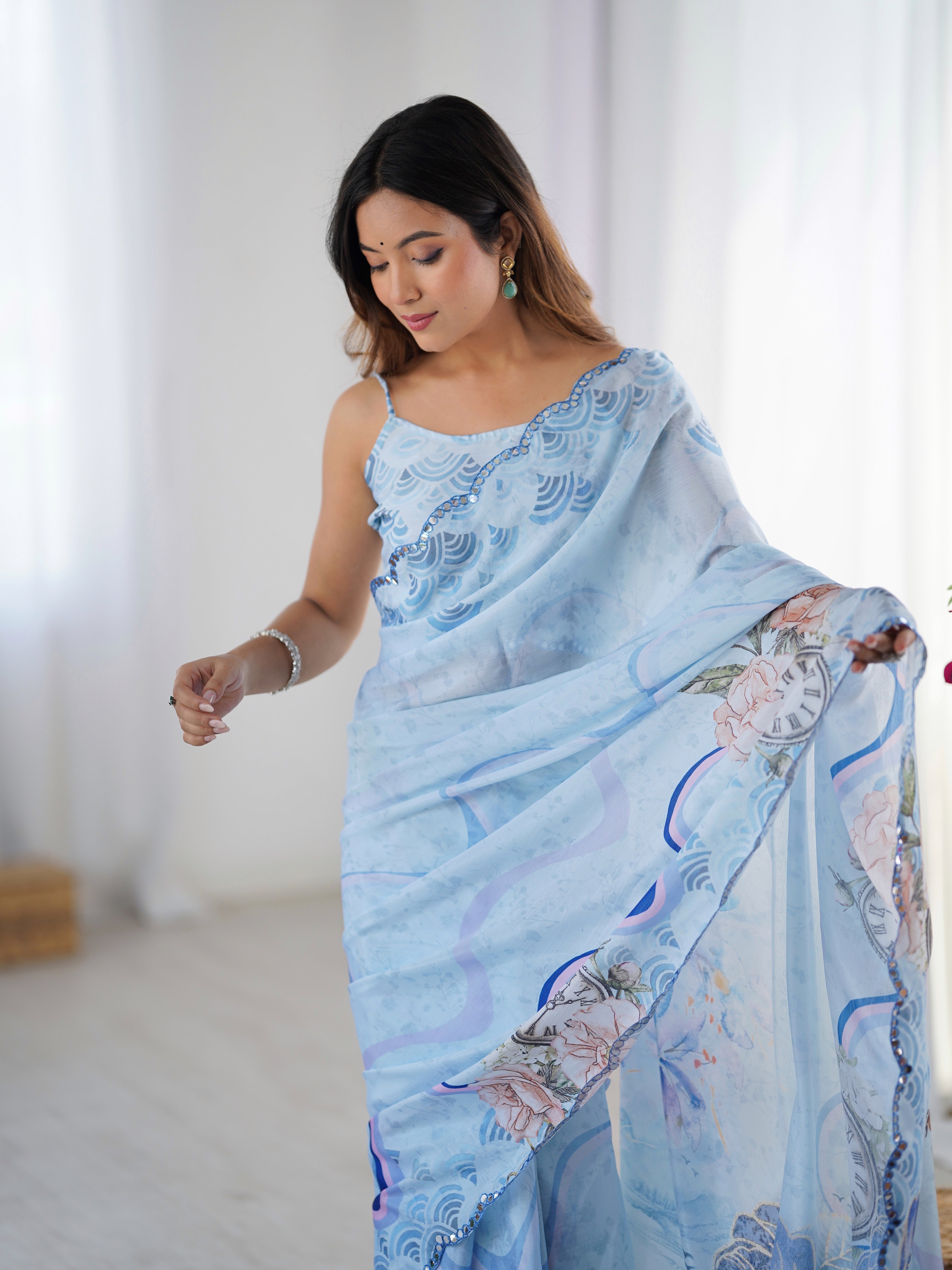 Elegant Sky Blue Chinnon Saree with Kutchi Work Mirror Lace Border