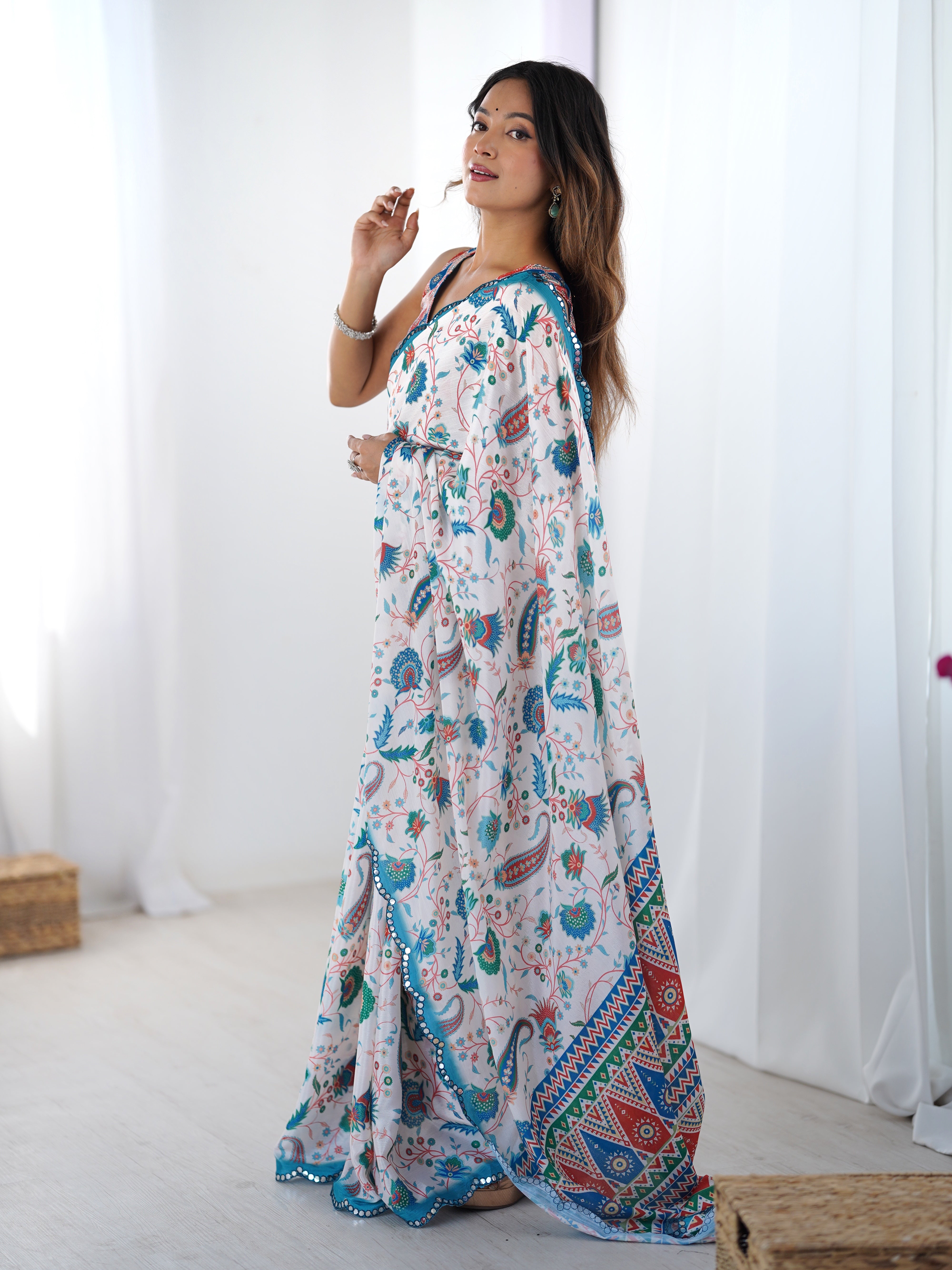 TRENDBUY elegant heavy chinnon printed saree with Kutchi mirror lace, worn by a model.