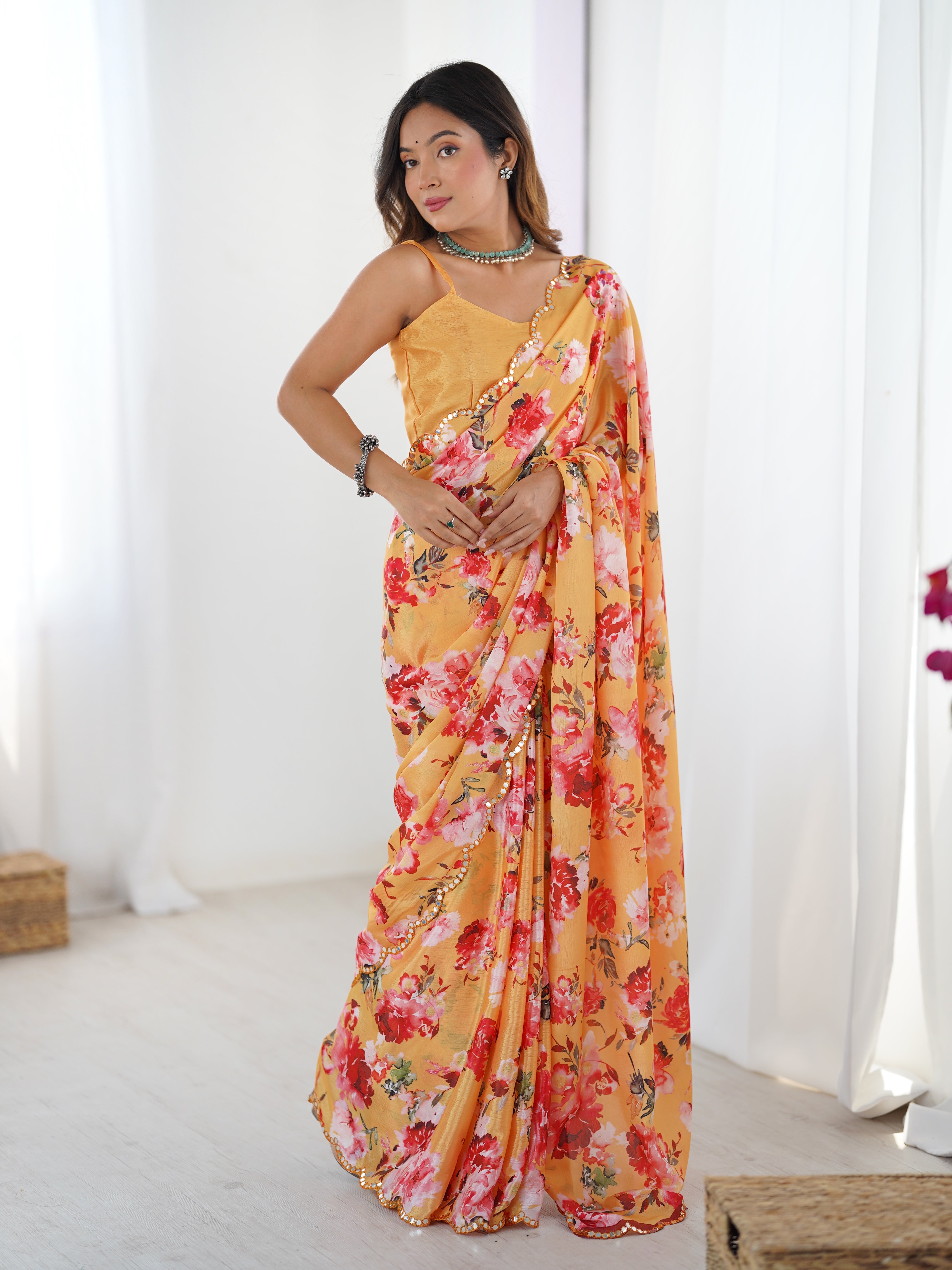 DVS-35 heavy chinnon saree with floral print & Kutchi mirror work border