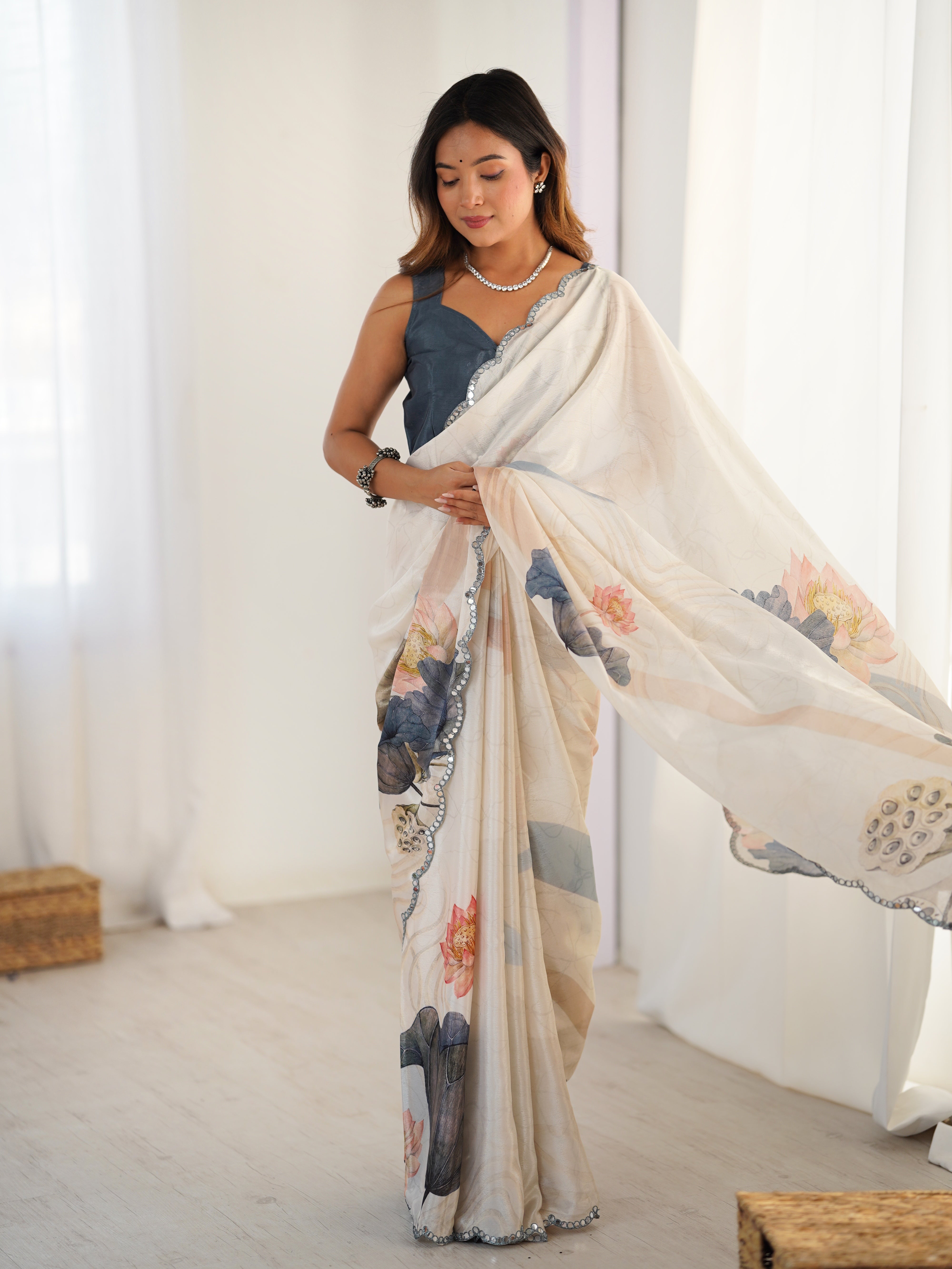 Heavy chinnon saree with beautiful print work and Kutchi mirror lace border