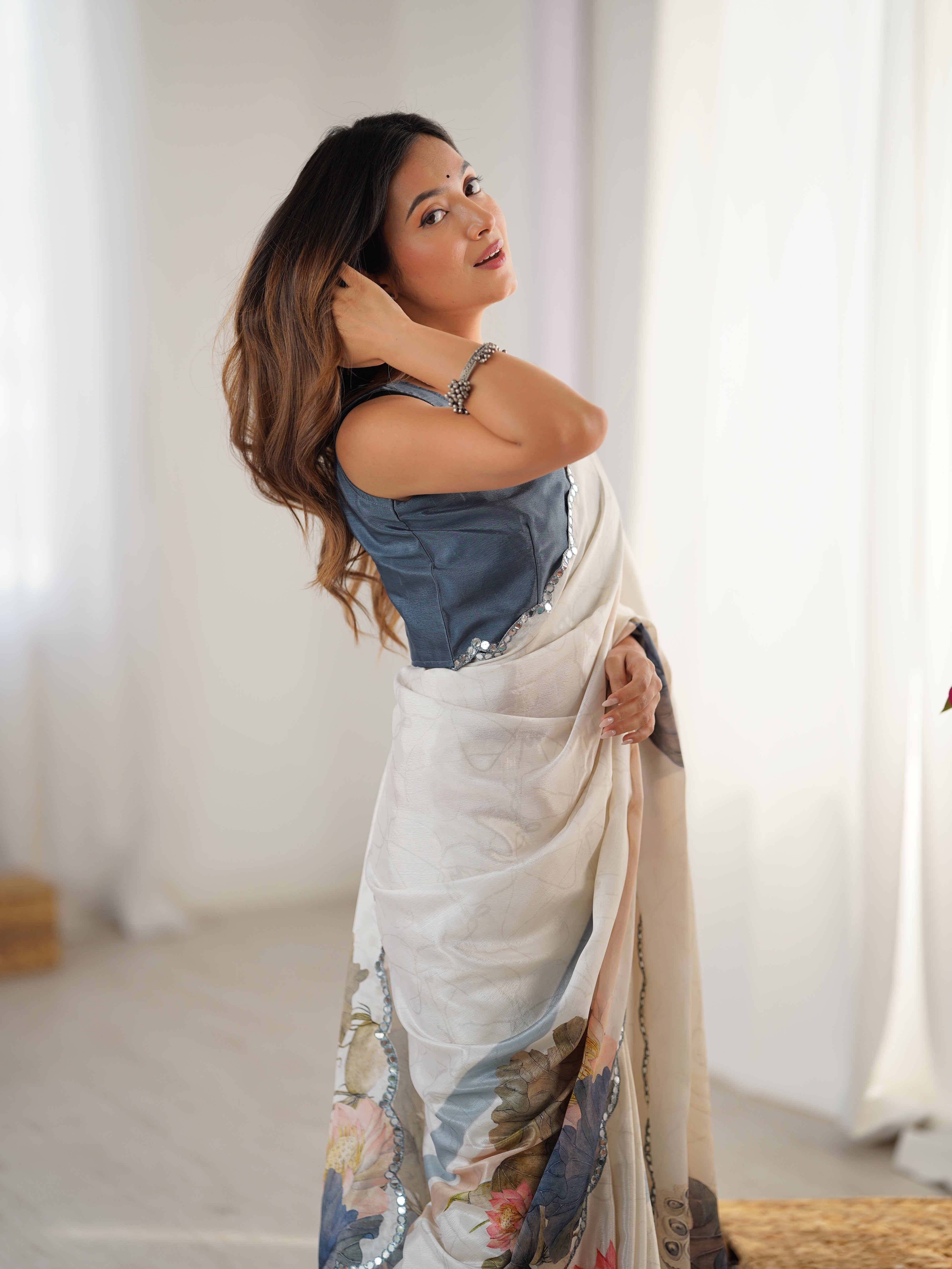 TRENDBUY Exclusive Heavy Chinnon Saree with beautiful print work & Kutchi mirror lace border