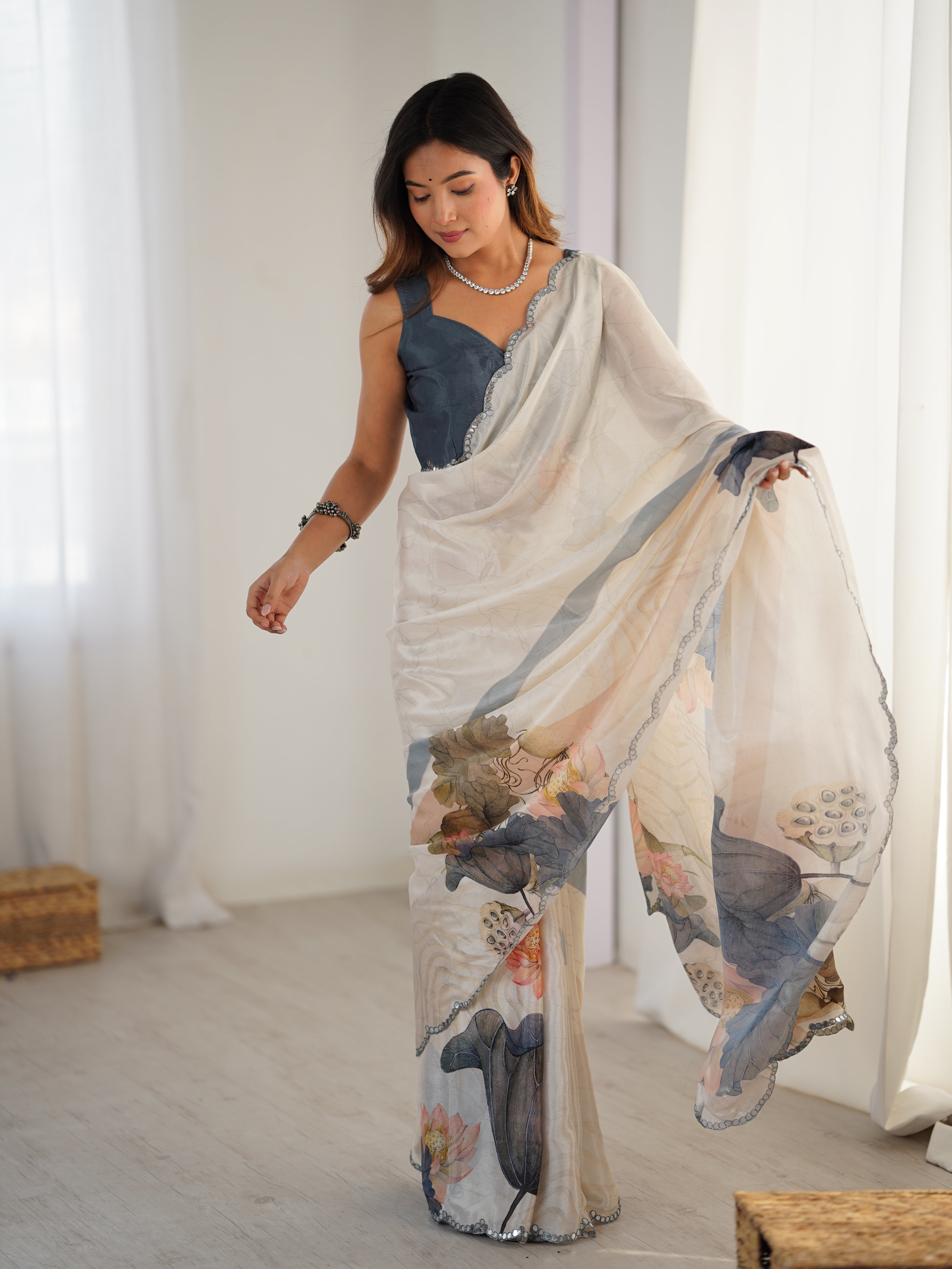 TRENDBUY Heavy Chinnon Saree featuring intricate print work & Kutchi mirror lace border